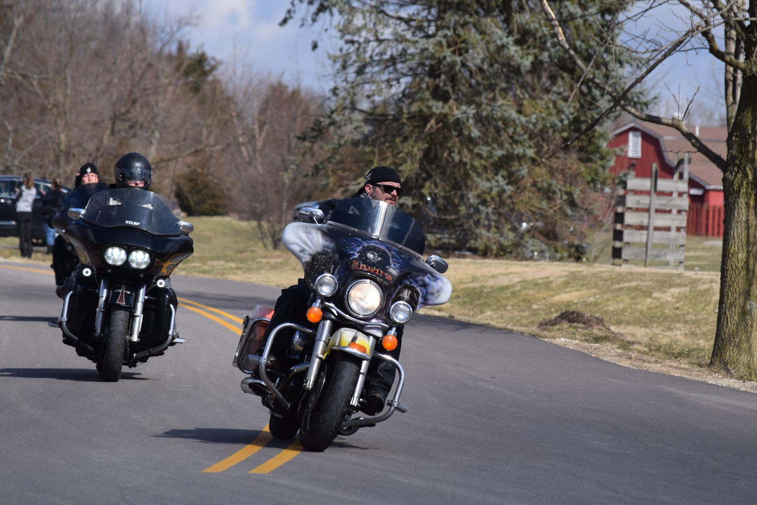 PHOTOS: Thousands of Outlaws attend motorcycle gang leaders funeral at Montgomery County Fairgrounds.