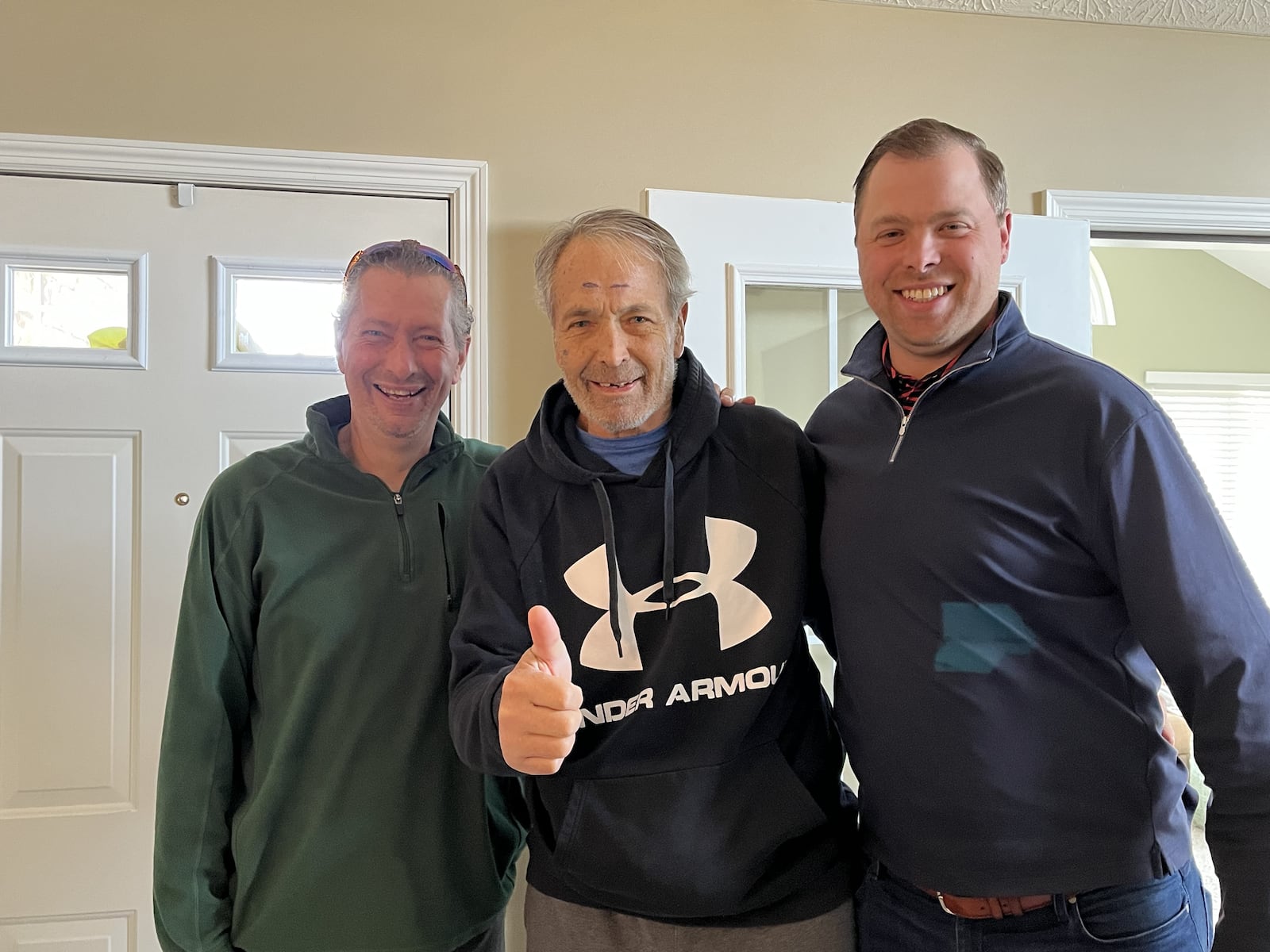 The day Bob Grote got home from the hospital after his near-death experience. He’s flanked by his brother Mike and son Scott. CONTRIBUTED