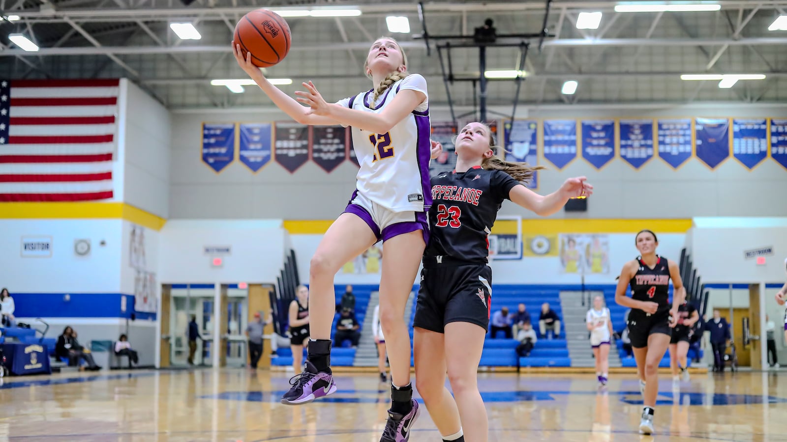 Bellbrook High School sophomore Lauren Fabrick drives to the basket against Tippecanoe's Mady Turner during their game on Wednesday night at Springfield High School. MICHAEL COOPER/CONTRIBUTED