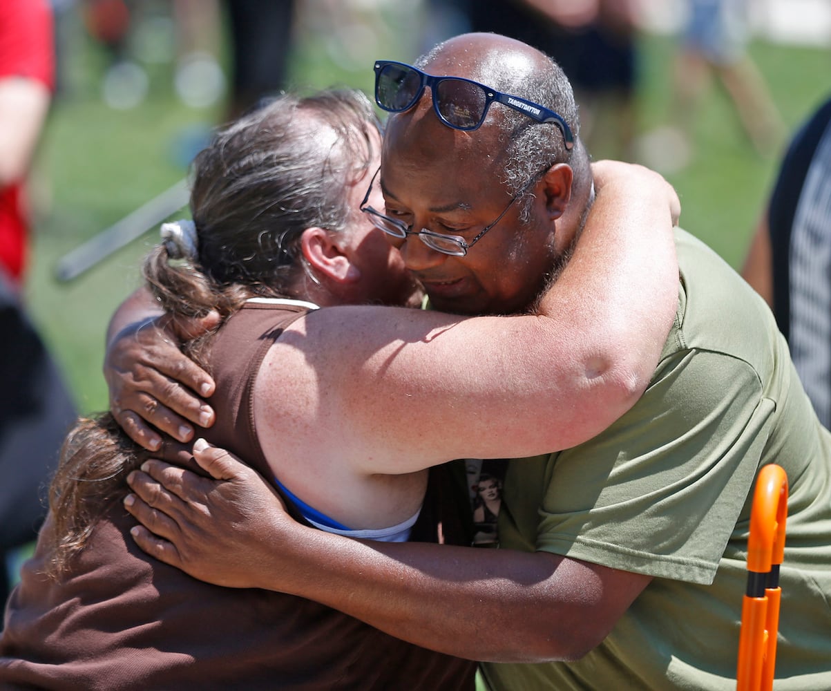 PHOTOS: Prayer vigil held for victims of Oregon District shooting