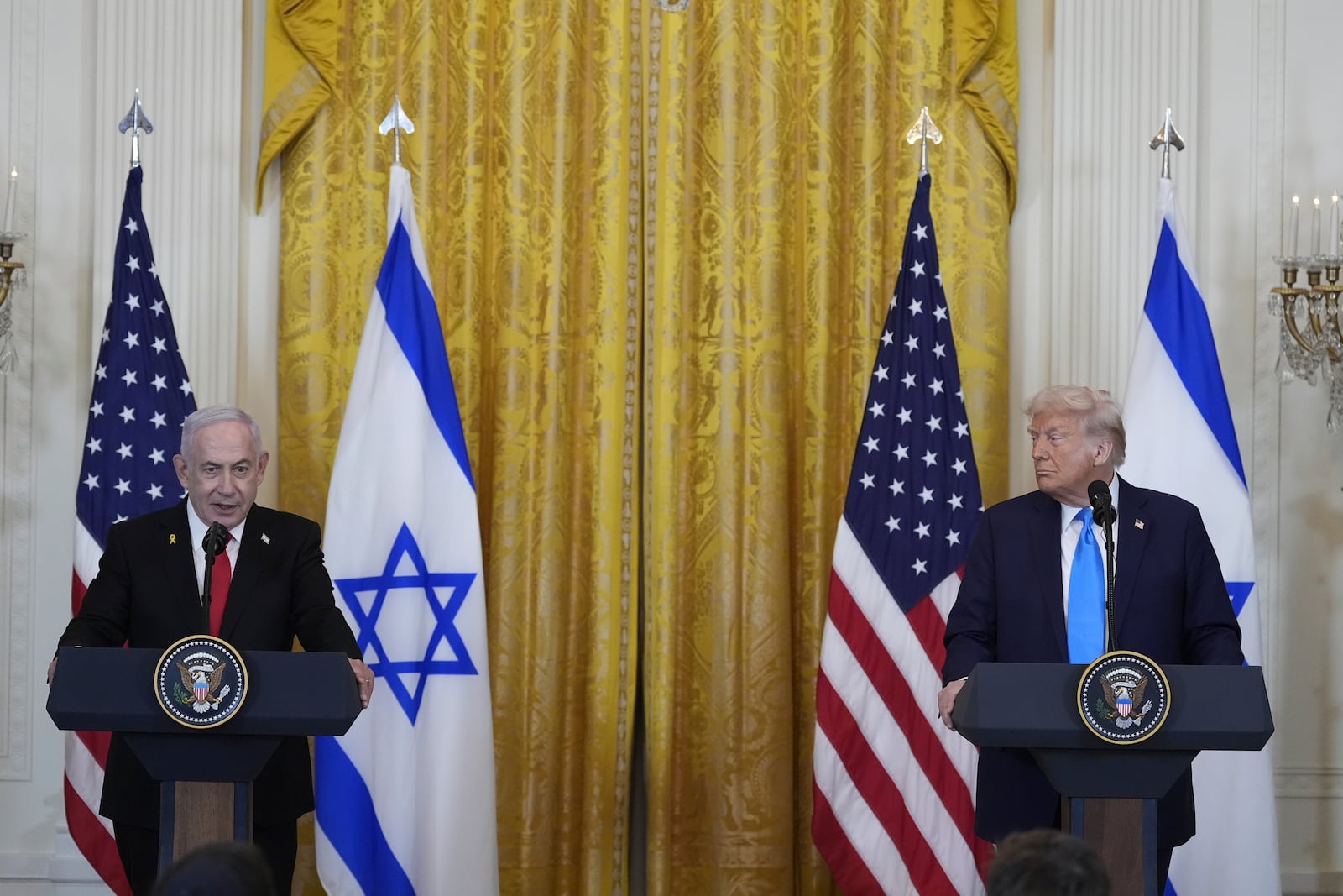 Israeli Prime Minister Benjamin Netanyahu speaks during a news conference with President Donald Trump in the East Room of the White House, Tuesday, Feb. 4, 2025, in Washington. (AP Photo/Alex Brandon)