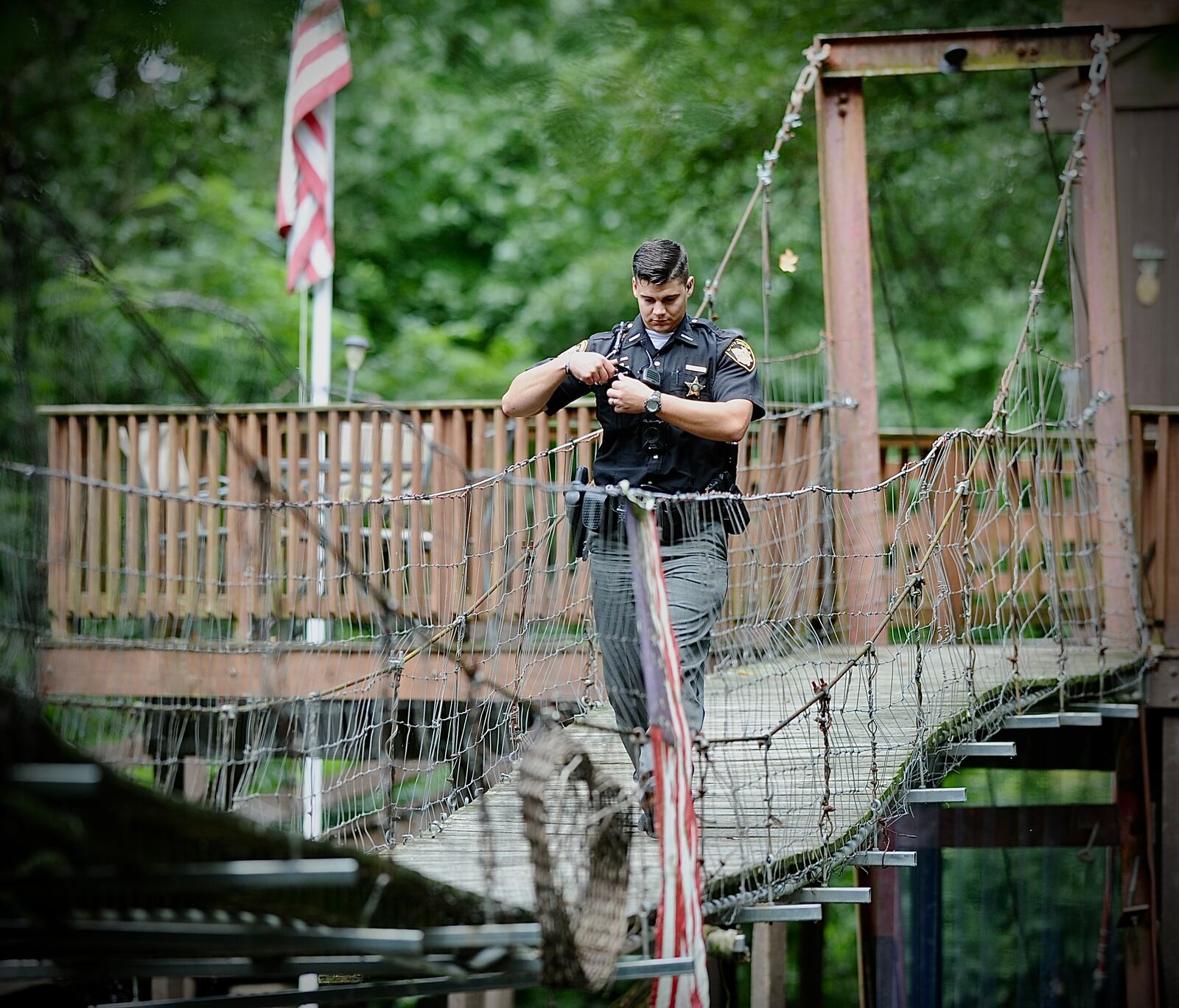 Greene County Sheriff's deputies and detectives were investigating outside in the 900 block of Ford Road in Xenia Twp. on Monday, Sept. 12, 2022, after an 18-year-old woman was shot and wounded during an apparent domestic dispute. MARSHALL GORBY/STAFF