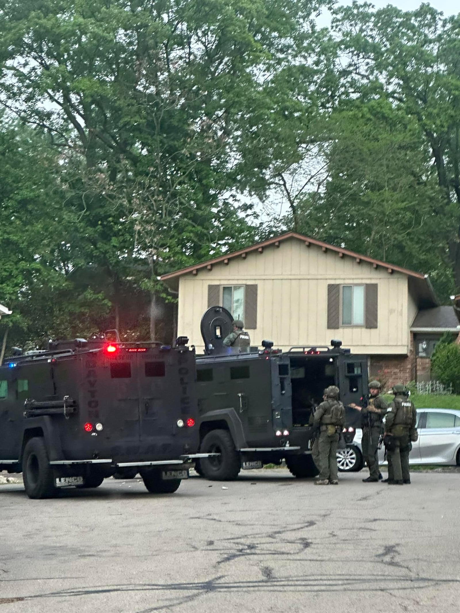 SWAT vehicles in standoff Sunday morning. (CONTRIBUTED: Karen Korn)