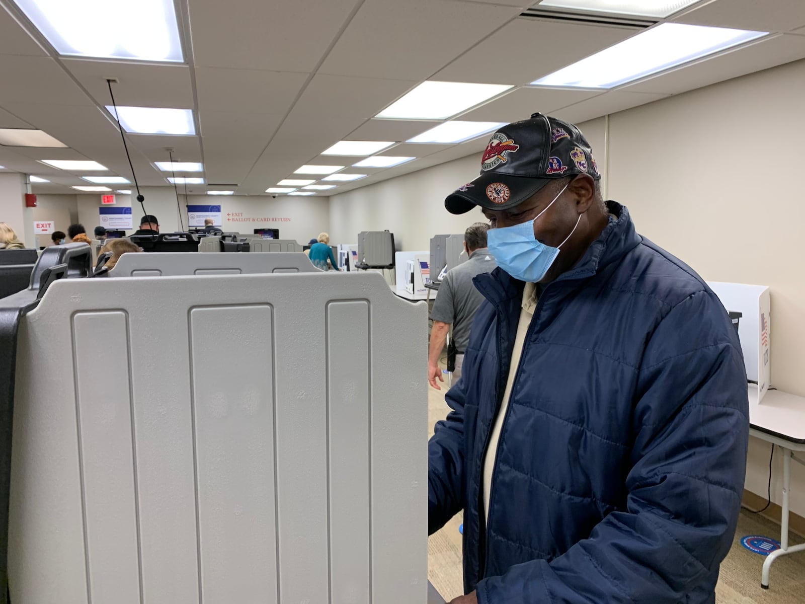 Ron Duncan casts of Brookville casts an in-person early ballot at the Montgomery County Board of Elections on Wednesday, Oct. 28.