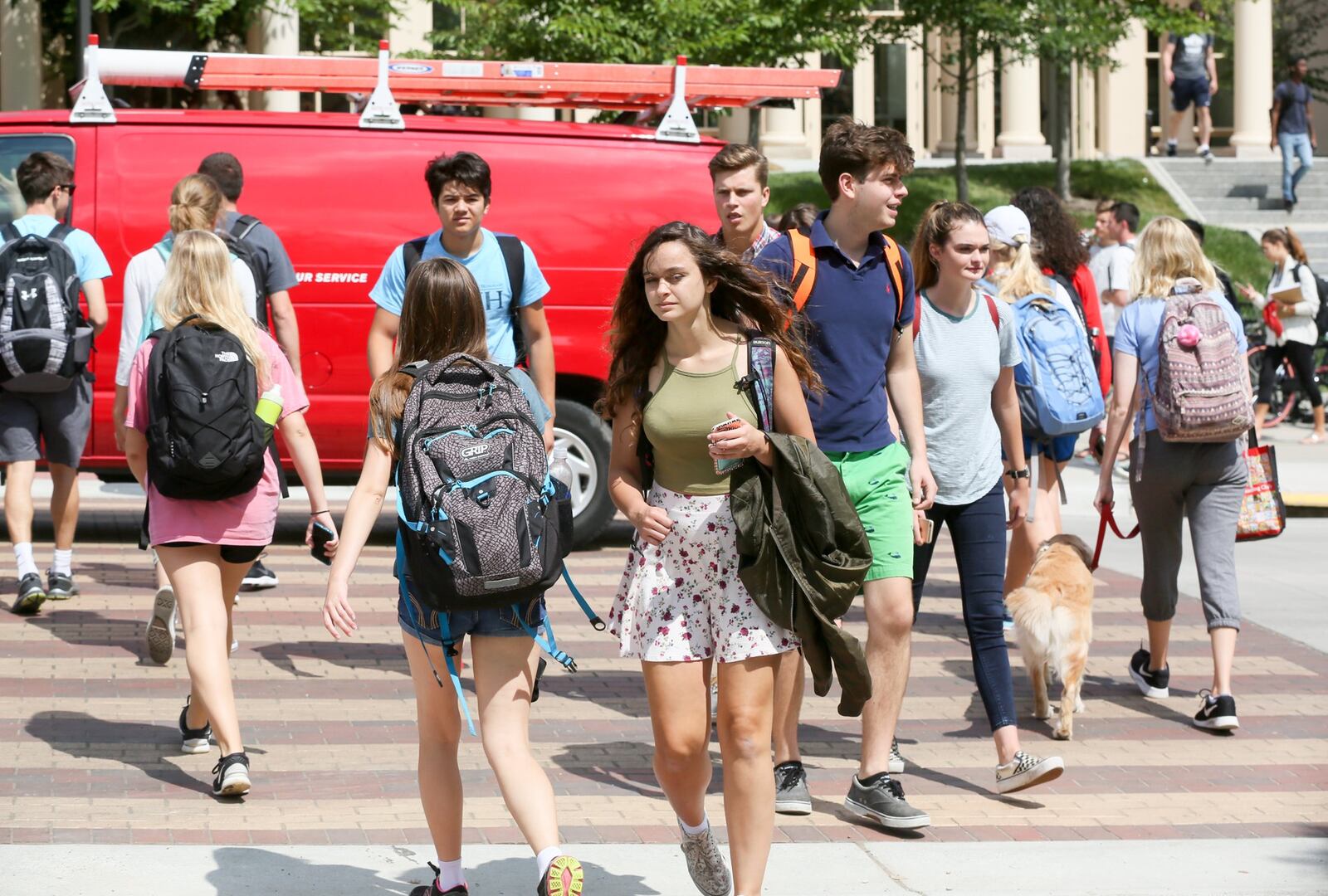 Students walk between class periods on the campus of Miami University in Oxford, Wednesday, Aug. 30, 2017. GREG LYNCH / STAFF