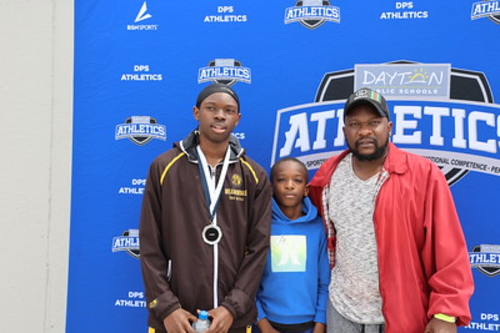 Floyd Ruttagah with his dad George and younger half-brother Tristan at Welcome Stadium. Dr. Floyd Thomas/CONTRIBUTED