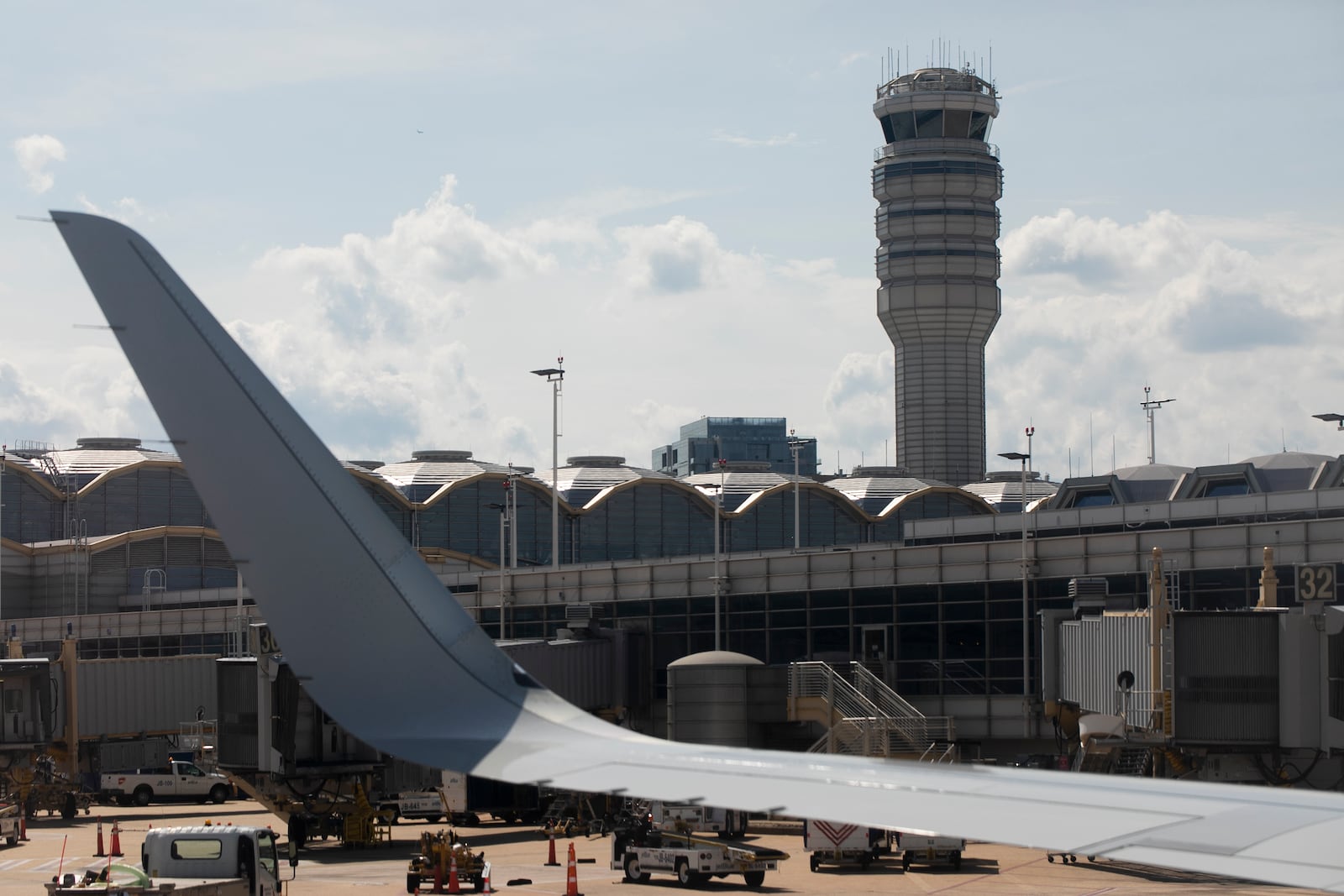 FILE - The air traffic control tower at Ronald Reagan Washington National Airport is seen, June 2, 2021, in Arlington, Va. (AP Photo/Jenny Kane, File)