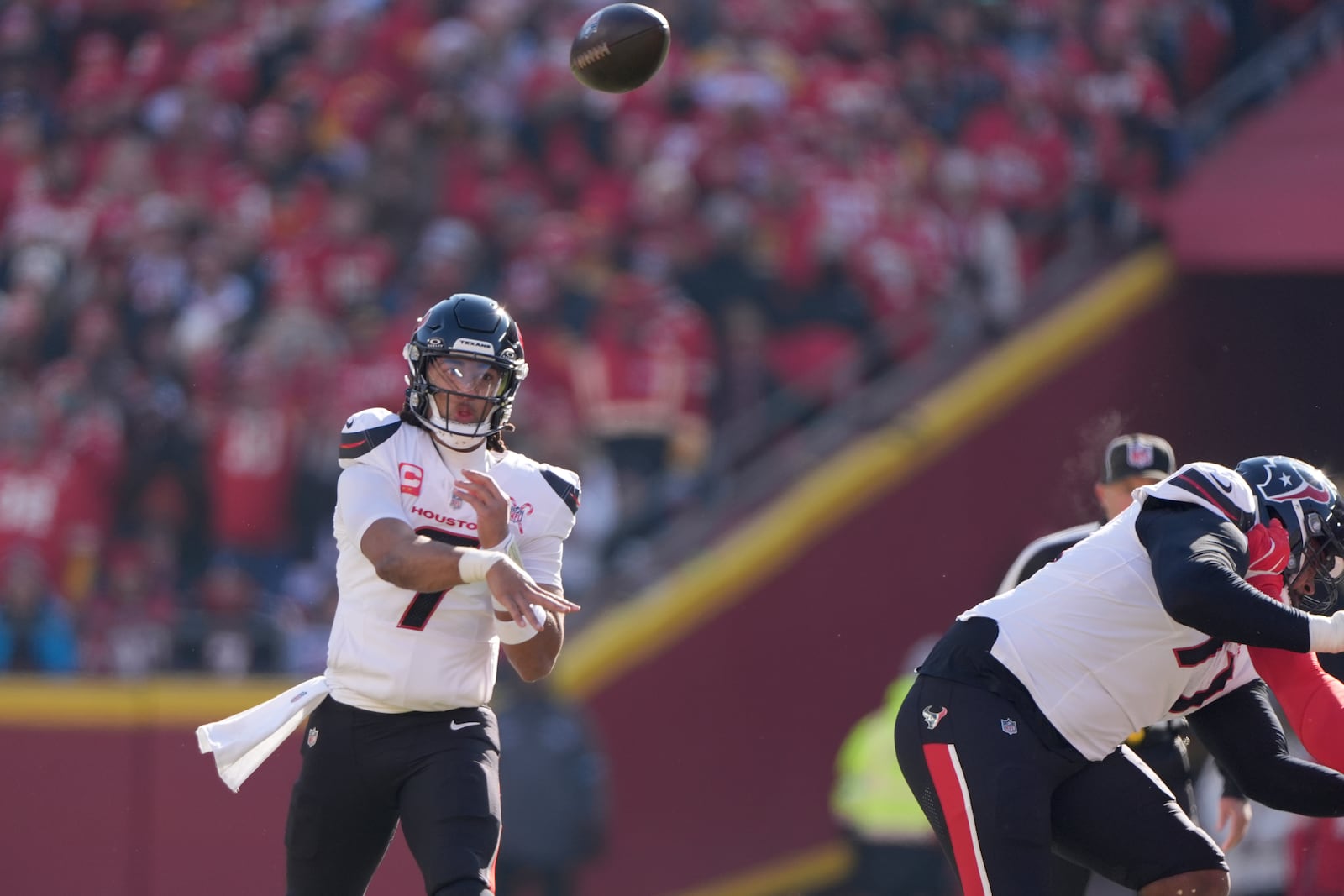 Houston Texans quarterback C.J. Stroud throws during the first half of an NFL football game against the Kansas City Chiefs Saturday, Dec. 21, 2024, in Kansas City, Mo. (AP Photo/Charlie Riedel)