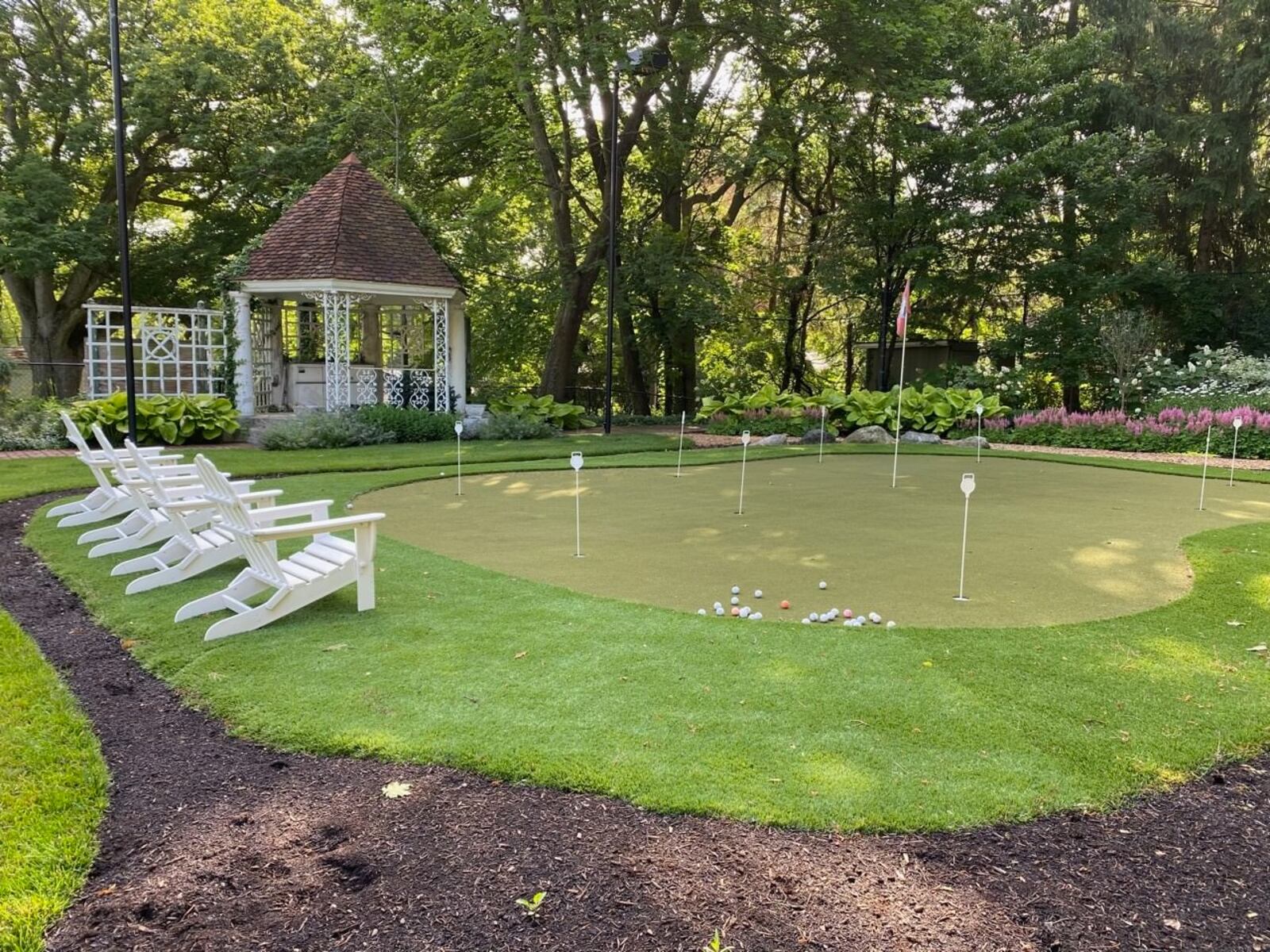 One of the gardens on the Garden Club of Dayton tour features a manicured putting green. CONTRIBUTED