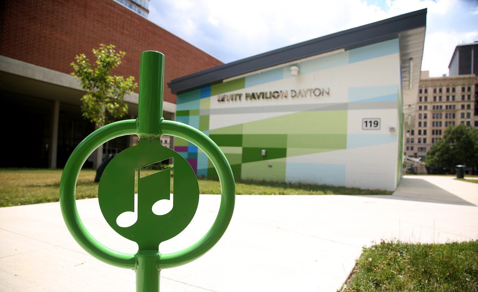 MixedA new mural, with poetry written by Sierra Leone,  has been completed at the Levitt Pavilion in Dayton. The poem, “Music Heals on Fifth and Main,” can be read in full on the north side of the building located east of the pavilion. The mural, a combination of bold shapes and bright colors, was designed by Brent Beck and executed by Atalie Gagnet, two local artists.   LISA POWELL / STAFF