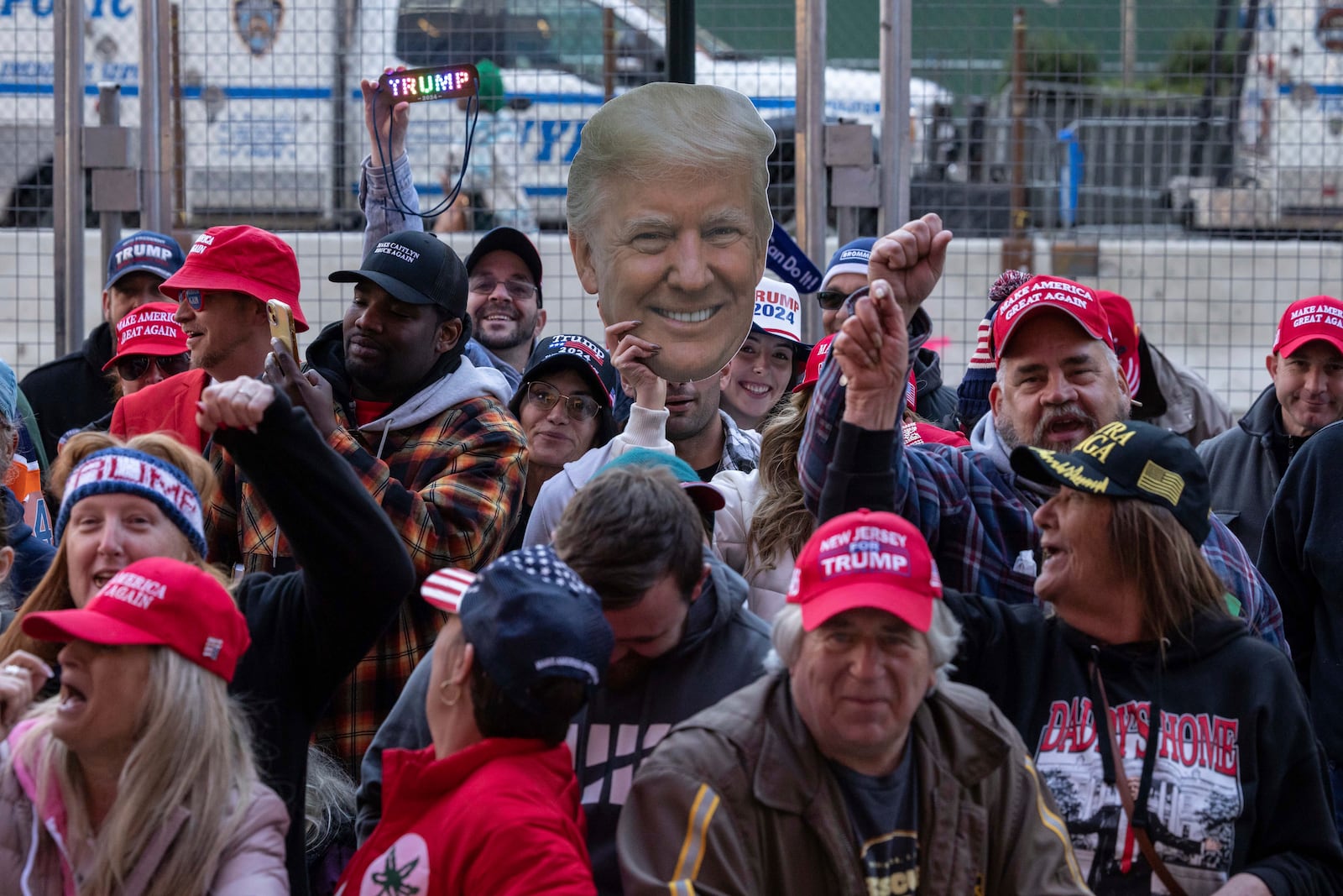 Supporters of Republican presidential nominee former President Donald Trump gather for his campaign rally outside Madison Square Garden, Sunday, Oct. 27, 2024, in New York. (AP Photo/Yuki Iwamura)