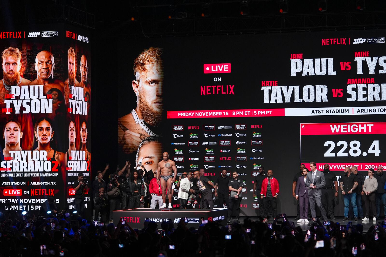 FILE - Mike Tyson steps on the scale during a weigh-in ahead of his heavyweight bout against Jake Paul, in Irving, Texas, in Irving, Texas. (AP Photo/Julio Cortez, File)