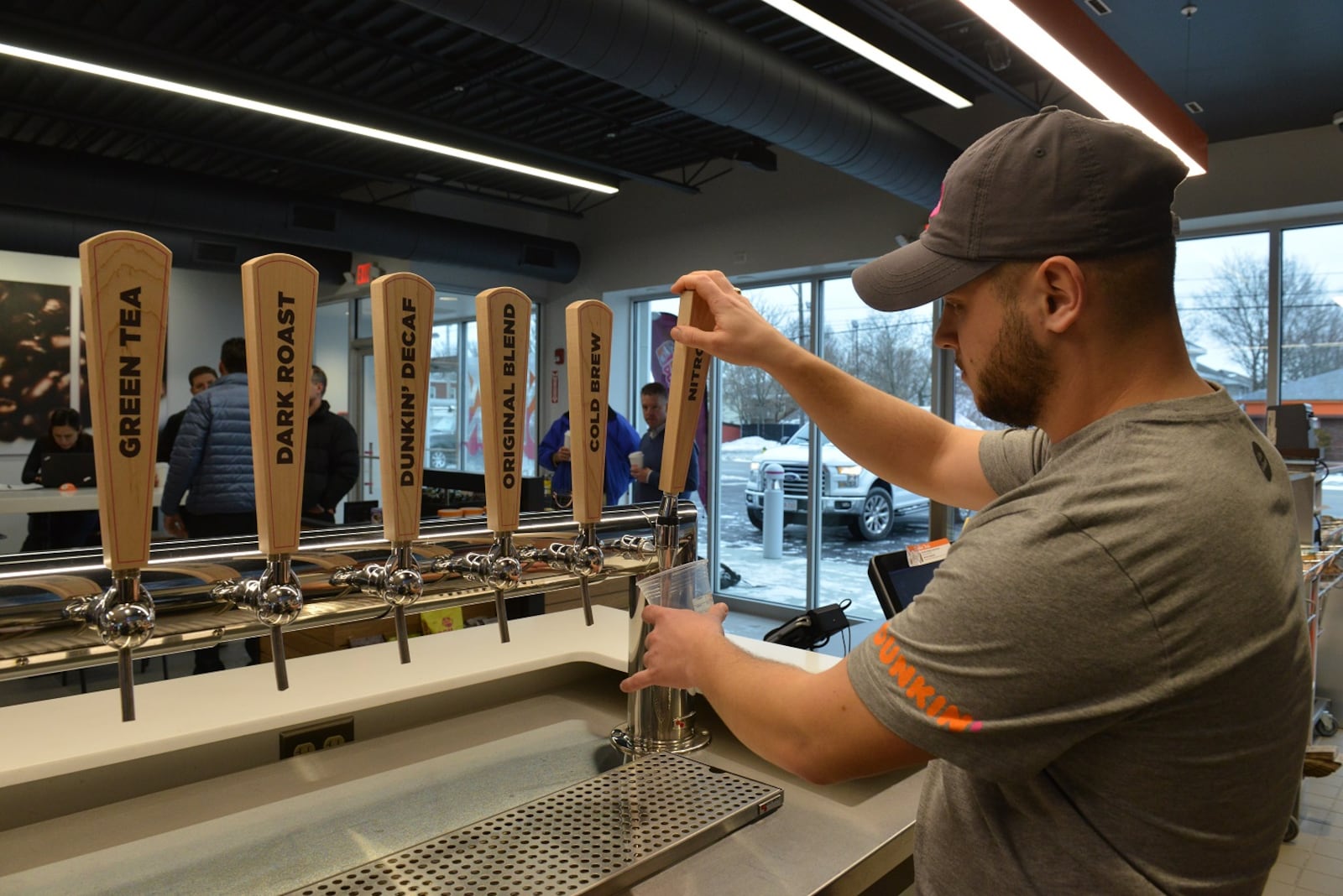 Dunkin' Donuts' new next-generation concept stores are now pouring cold beverages through a tap system. CONTRIBUTED