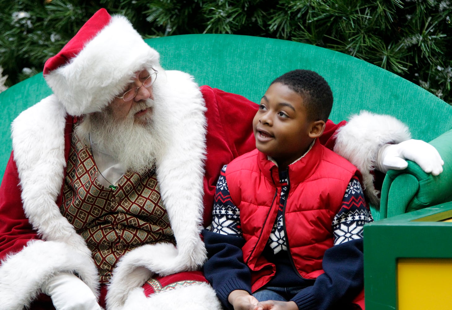 PHOTOS: A visit with Santa Claus makes the holiday season magical