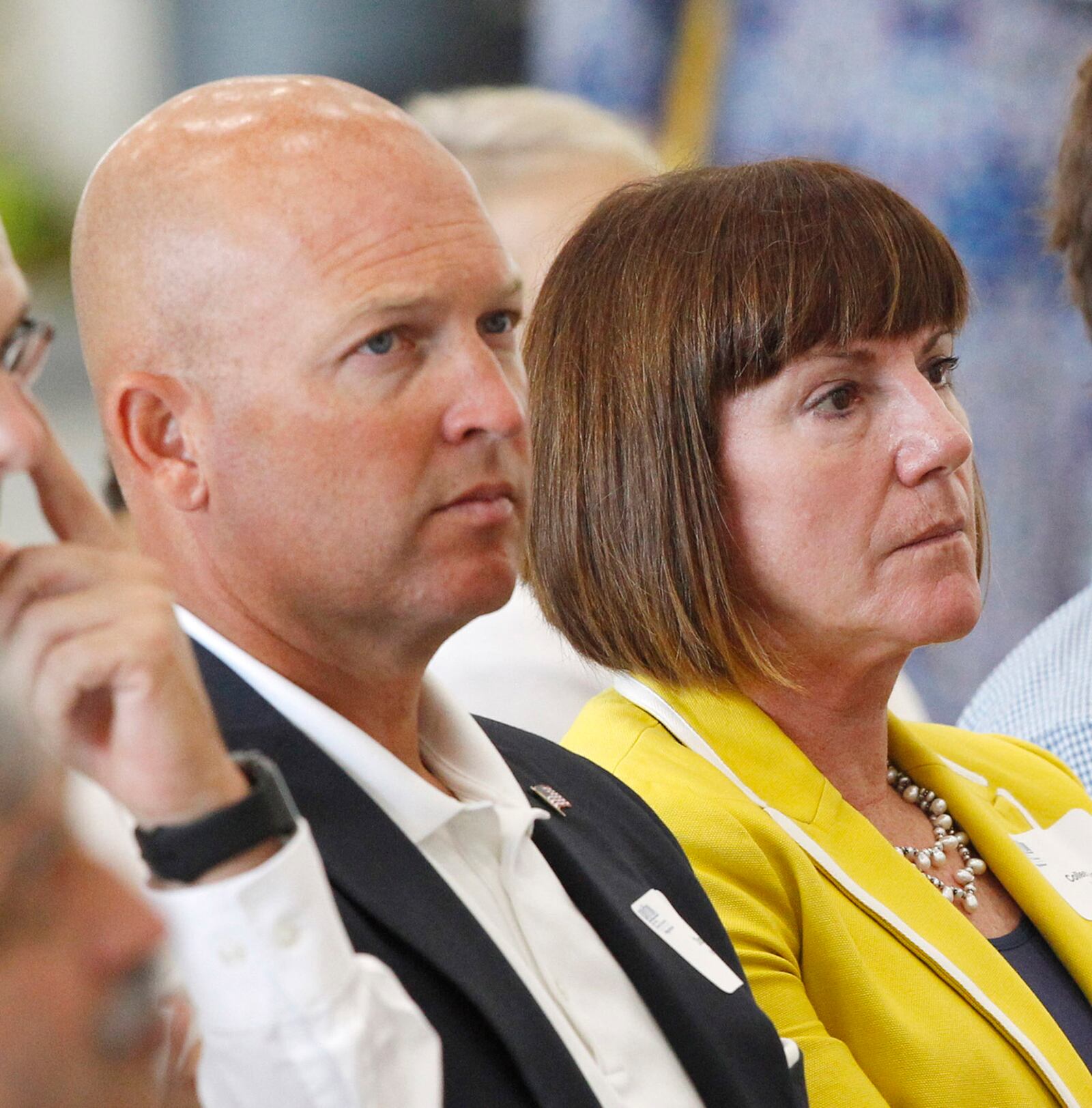 Doug Barry, Barry Staff and Coleen Ryan, Vectren, attended a Dayton Chamber of Commerce meeting at the Dayton Airport where candidates for Ohio Governor spoke on Thursday, August 16.   TY GREENLEES / STAFF