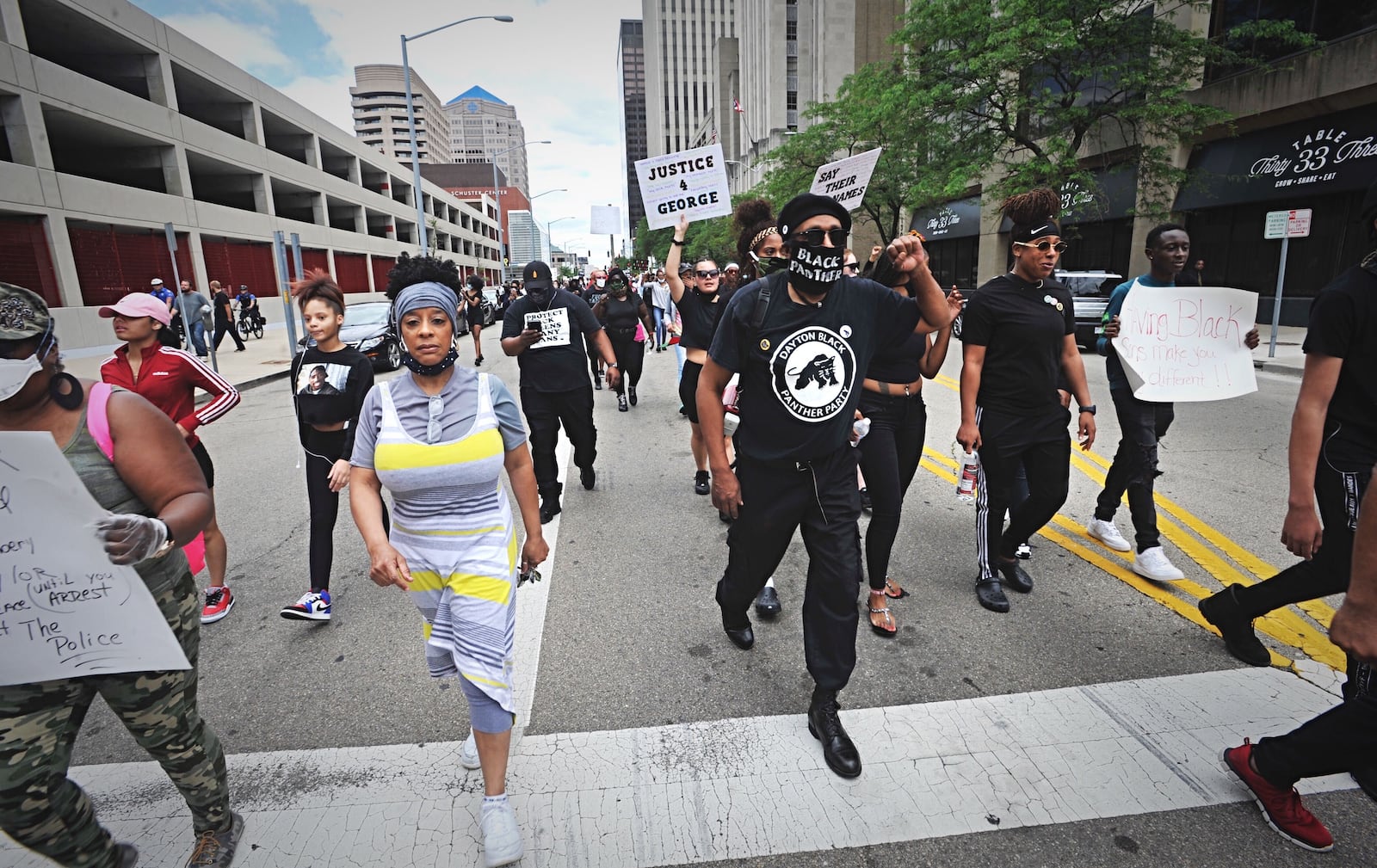 A protest event that began at the federal building in downtown Dayton on Saturday, May 30, 2020, moved to the area of Jones Street and Wayne Avenue, where police stopped marchers from entering U.S. 35 by using pepper spray balls and a line of officers. MARSHALL GORBY / STAFF