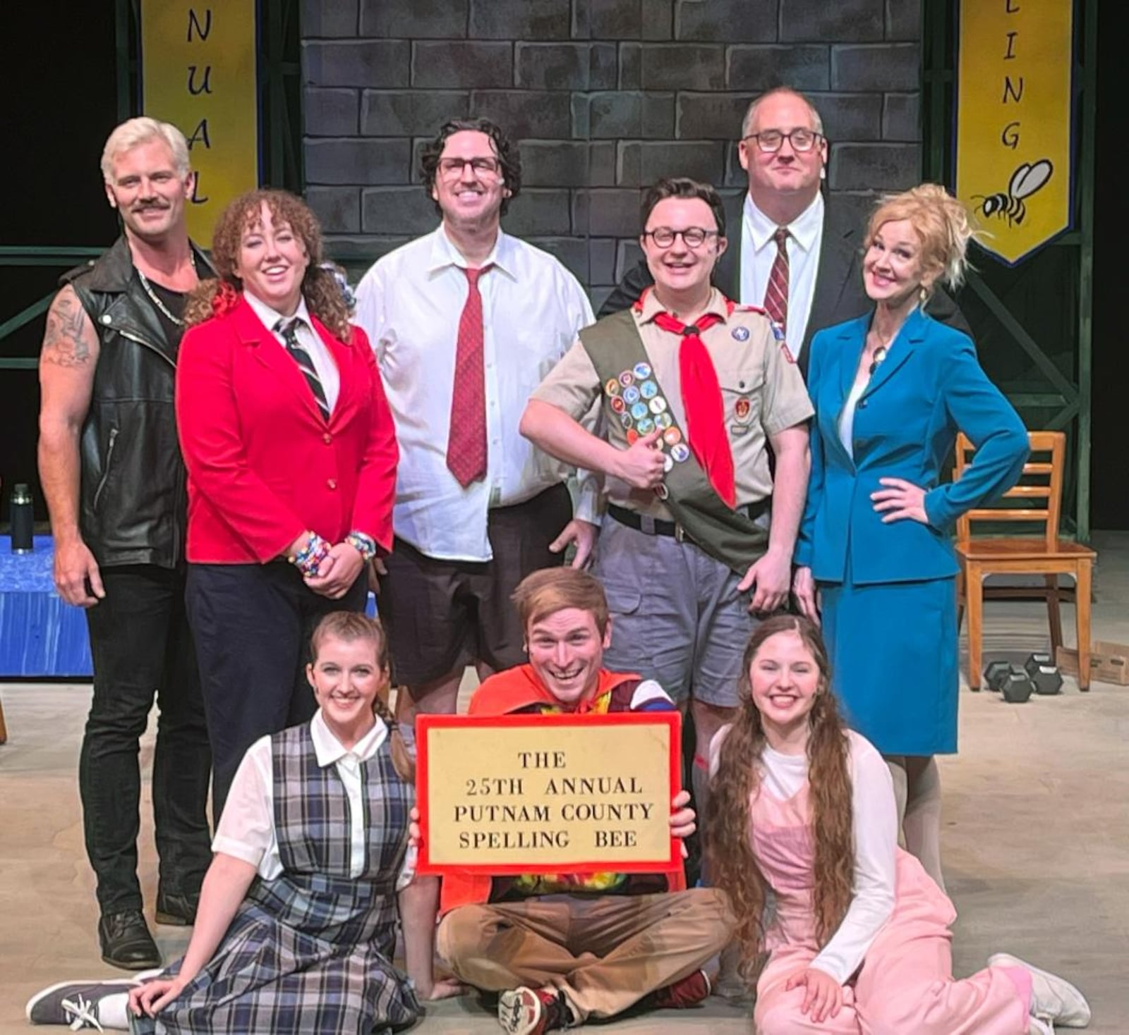 La Comedia Dinner Theatre's production of "The 25th Annual Putnam County Spelling Bee" features: (back row, left to right) Tyler Kirk (Mitch Mahoney), Madeline Nichole (Logainne Schwartzandgrubenierre), Christopher Norton (William Barfee), Kyle Krichbaum (Chip Tolentino), Jason S. Lakes (Vice-Principal Douglas Panch), Karie-Lee Sutherland (Rona Lisa Peretti) (front row, left to right) Allison Gabert (March Park), Jonathan Pendergrass (Leaf Coneybear), and Eva Bower (Olive Ostrovsky).

