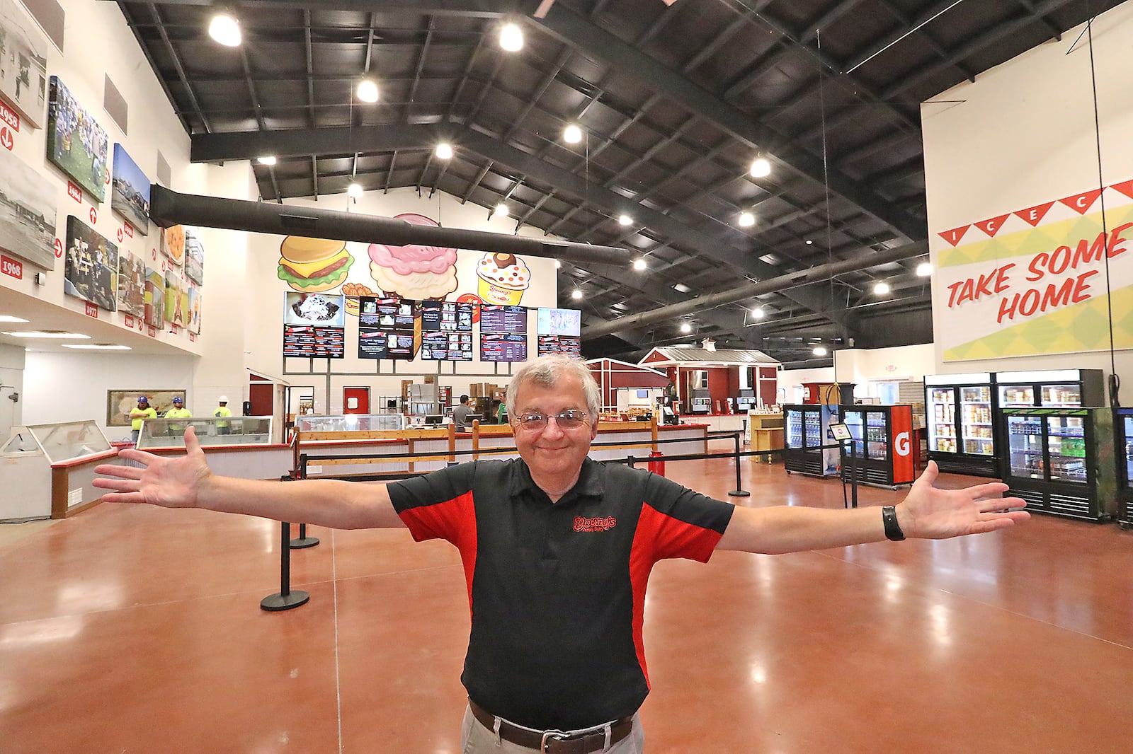 Dan Young unveils the new Young's Jersey Dairy in August 2021. BILL LACKEY/STAFF