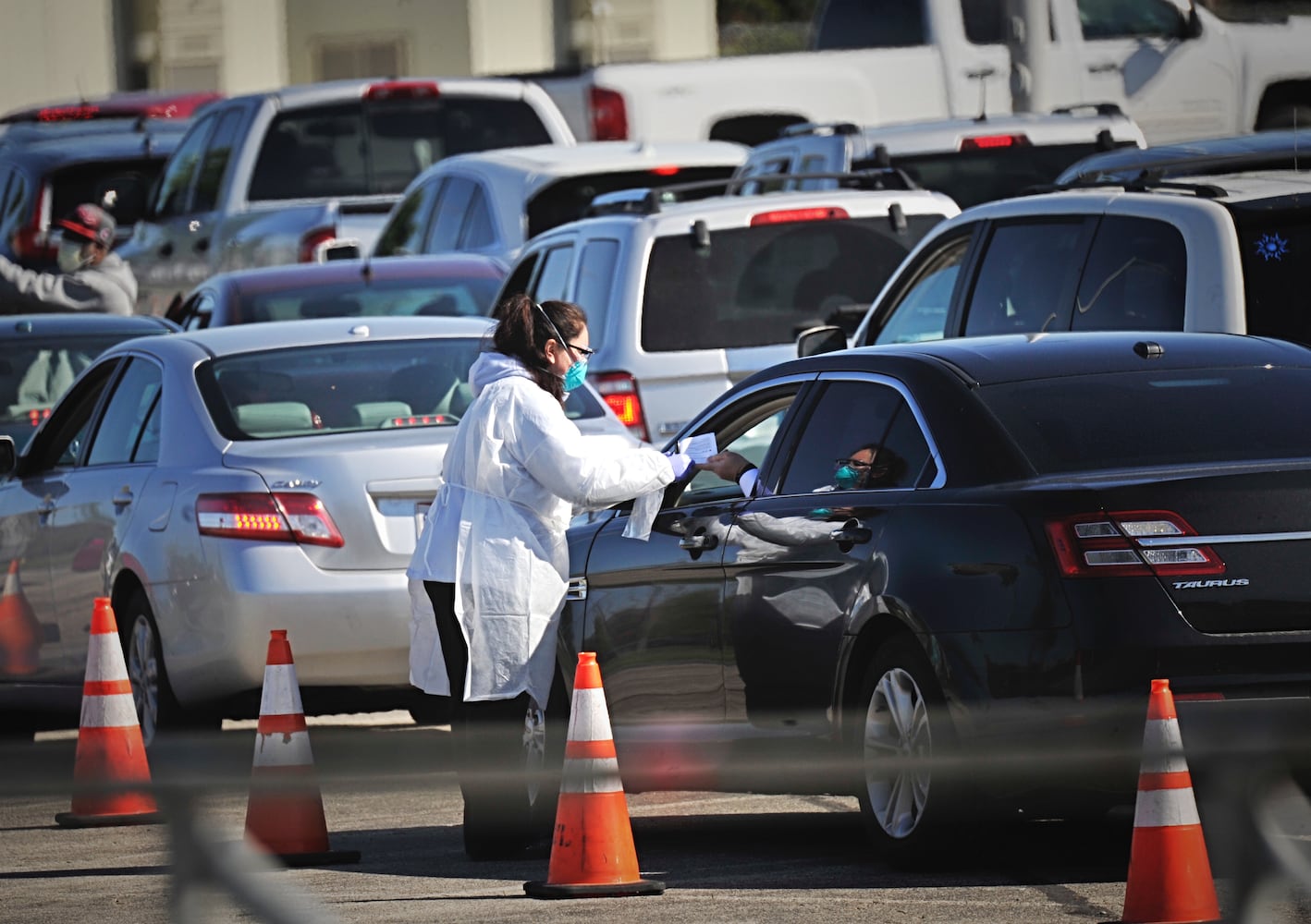 PHOTOS: Crowd lines up for antibody testing at UD Arena