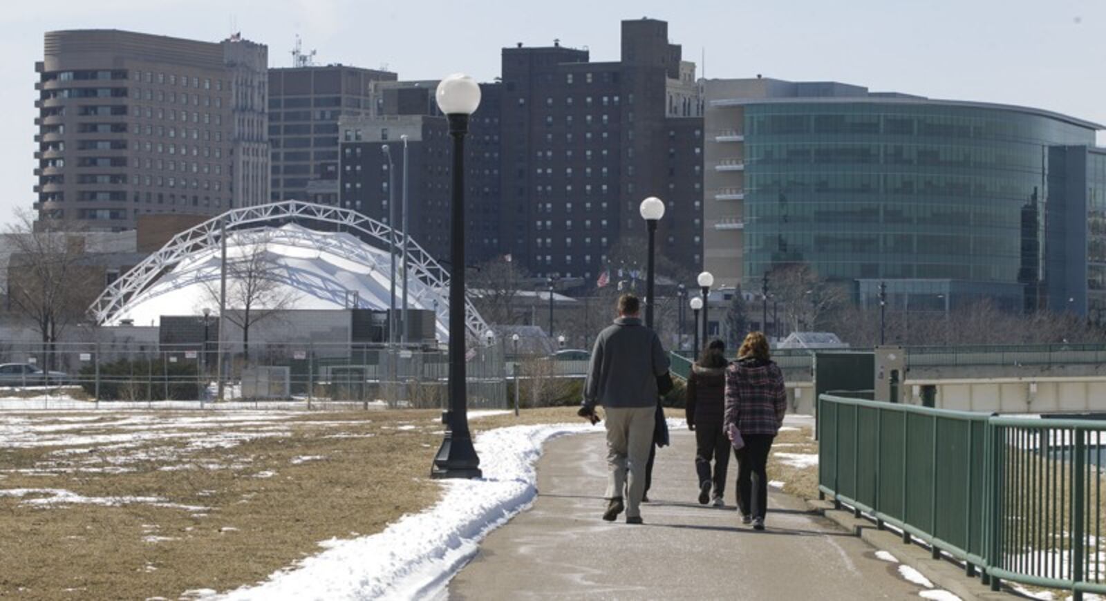 Workers from downtown Dayton walk back toward Riverscape from Deeds Point after a lunch hour walk.