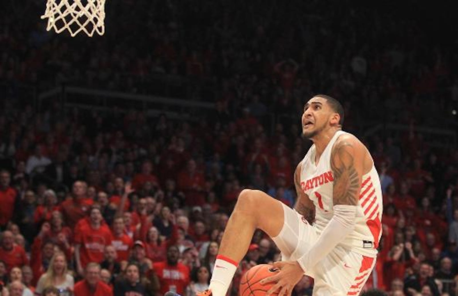 Dayton’s Obi Toppin dunks against George Washington on Saturday, March 7, 2020, at UD Arena. David Jablonski/Staff