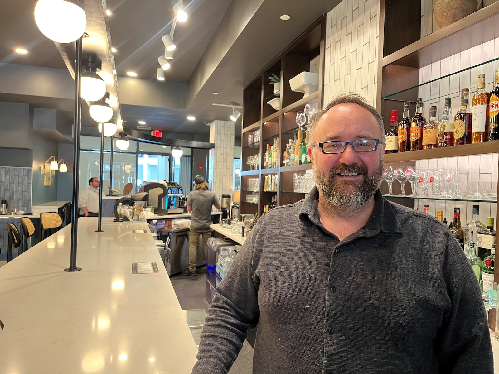 Shane Anderson, owner of Ghostlight Coffee, at Gather by Ghostlight at the Dayton Arcade. CORNELIUS FROLIK / STAFF