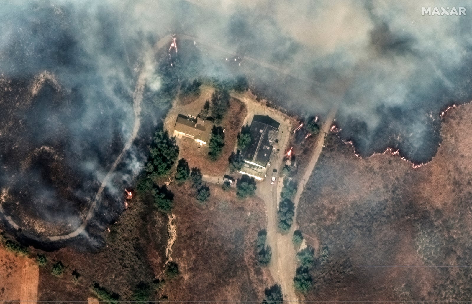 This satellite image released by Maxar Technologies shows the flames surrounding a house near Moorpark, Calif., on Thursday Nov. 7, 2024. (Satellite image ©2024 Maxar Technologies via AP)