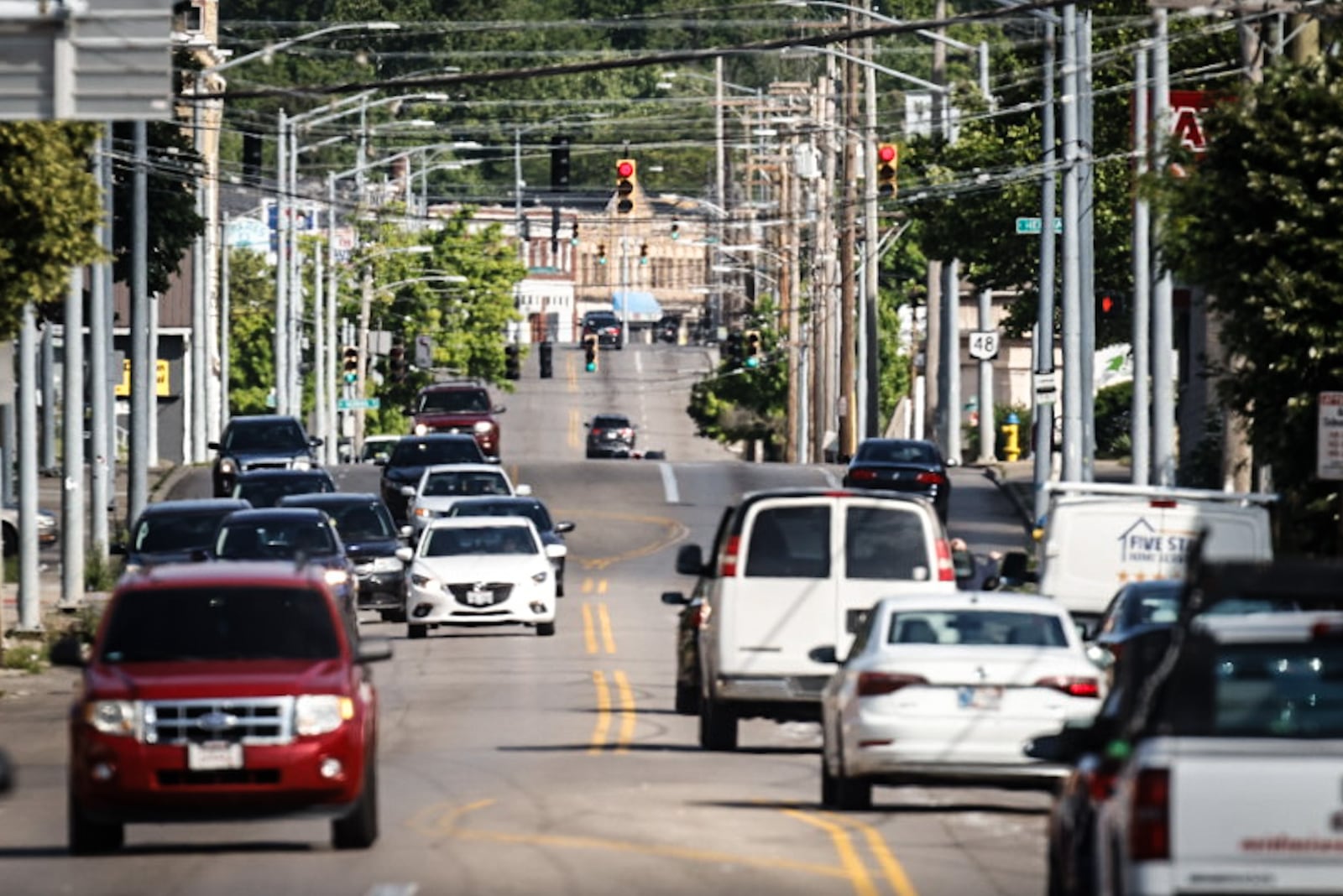 North Main Street north of Great Miami Boulevard will go from four lanes to two with a turn lane in the middle.