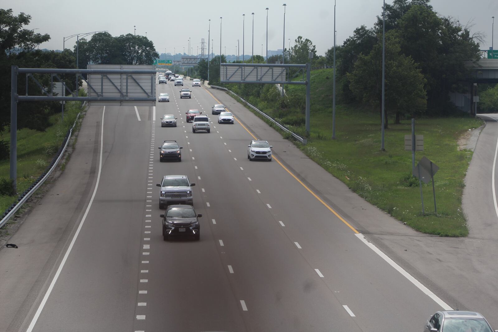 Traffic travels westbound on U.S. 35 in downtown Dayton on July 28, 2023. CORNELIUS FROLIK / STAFF