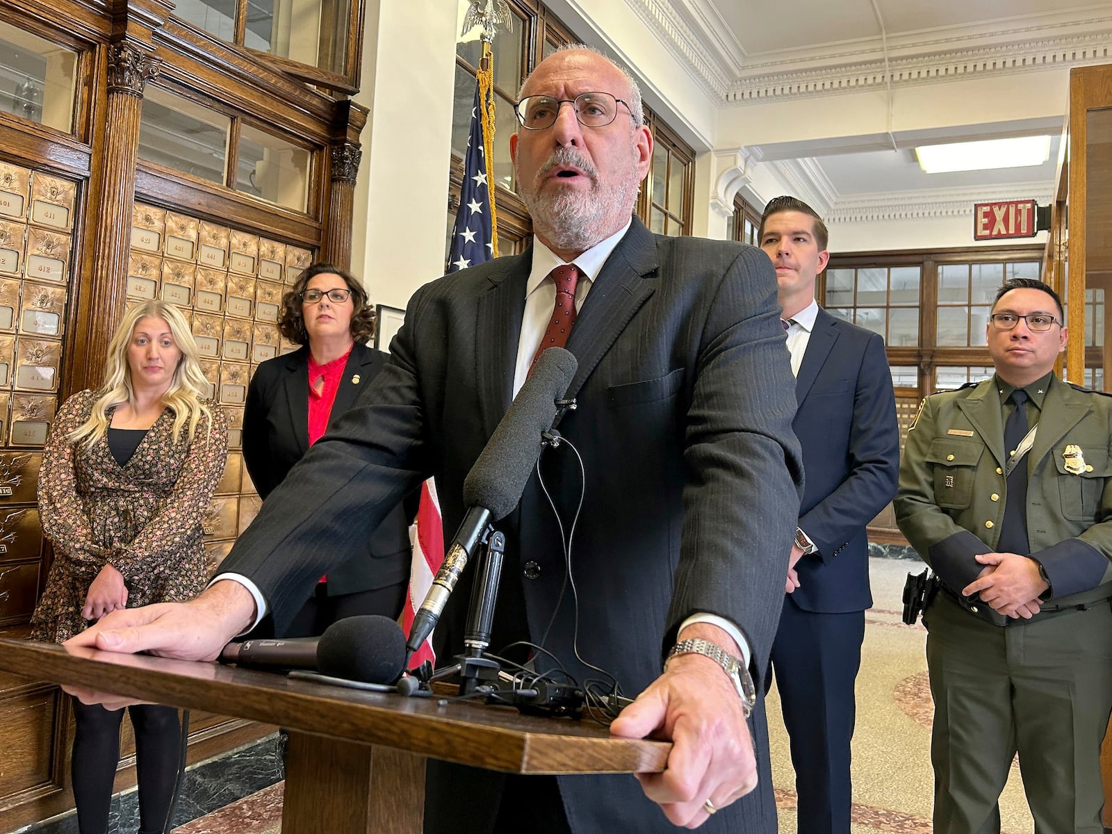 Minnesota U.S. Attorney Andy Luger addresses reporters on Friday, Nov. 22, 2024, at the federal courthouse in Fergus Falls, Minn., after two men were found guilty of human smuggling charges in connection with a case that led to the deaths of a family of four from India, who tried to cross the Canada-U.S. border during a blizzard in 2022. (Steve Lambert/The Canadian Press via AP)