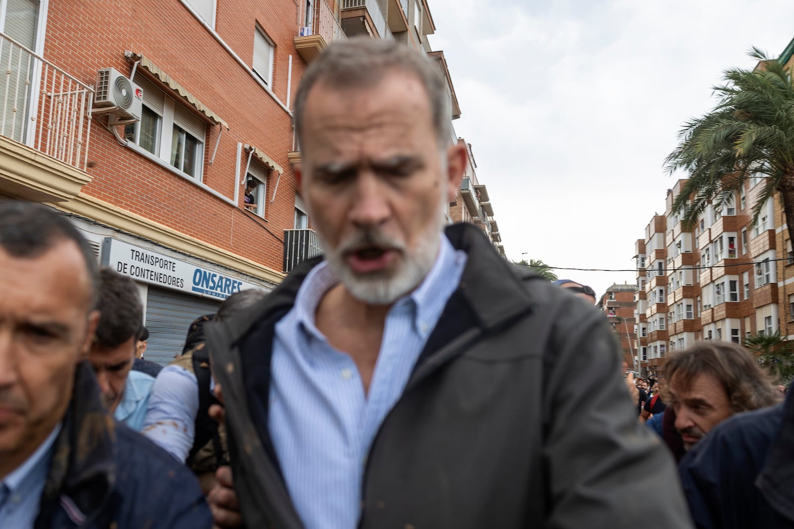 Spain's King Felipe VI walks amidst angry Spanish flood survivors in Paiporta, near Valencia, Spain, Sunday Nov. 3, 2024. (AP Photo/David Melero)