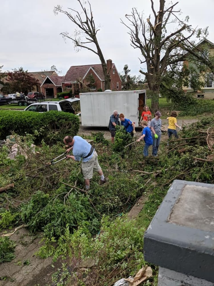 Photos: Community rallies around Dayton restaurant owner after son’s death, tornado