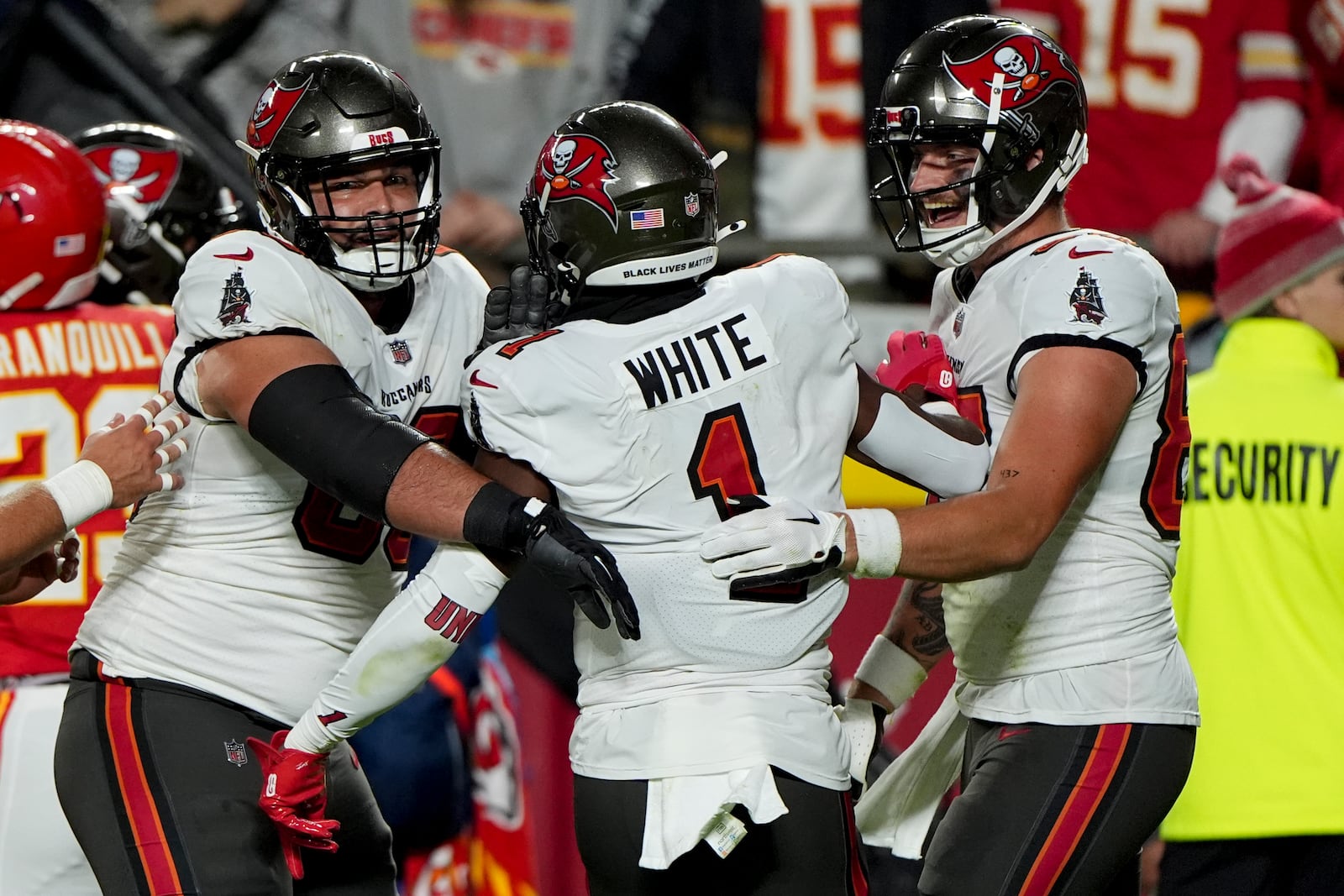 Tampa Bay Buccaneers running back Rachaad White (1) celebrates with teammates his touchdown against the Kansas City Chiefs during the first half of an NFL football game, Monday, Nov. 4, 2024, in Kansas City, Mo. (AP Photo/Charlie Riedel)