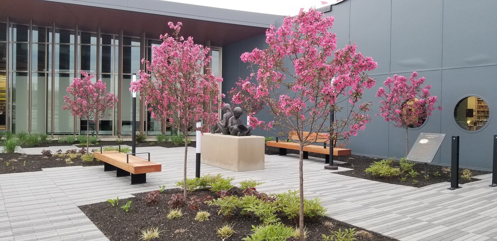 The Storytime sculpture at the Far Hills Avenue Woodbourne branch of the Washington-Centerville Public Library was part of a $5 million renovation and expansion. CONTRIBUTED