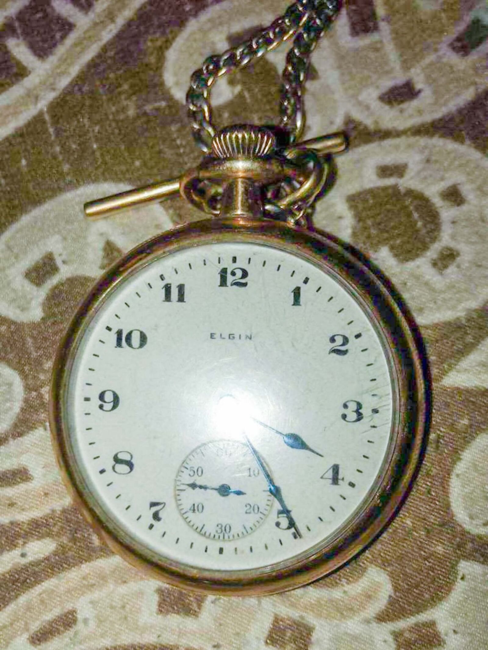 This Elgin pocket watch was stolen during a home invasion 23 years ago in Lexington. A Middletown man, Larry Glenn, was recently given the watch as collateral and he tracked down the original owners. SUBMITTED PHOTO