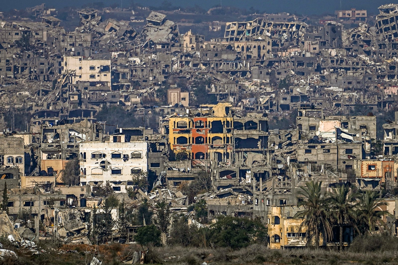 A destroyed part of Gaza City as seen from southern Israel, Thursday Jan. 2, 2025. (AP Photo/Tsafrir Abayov))