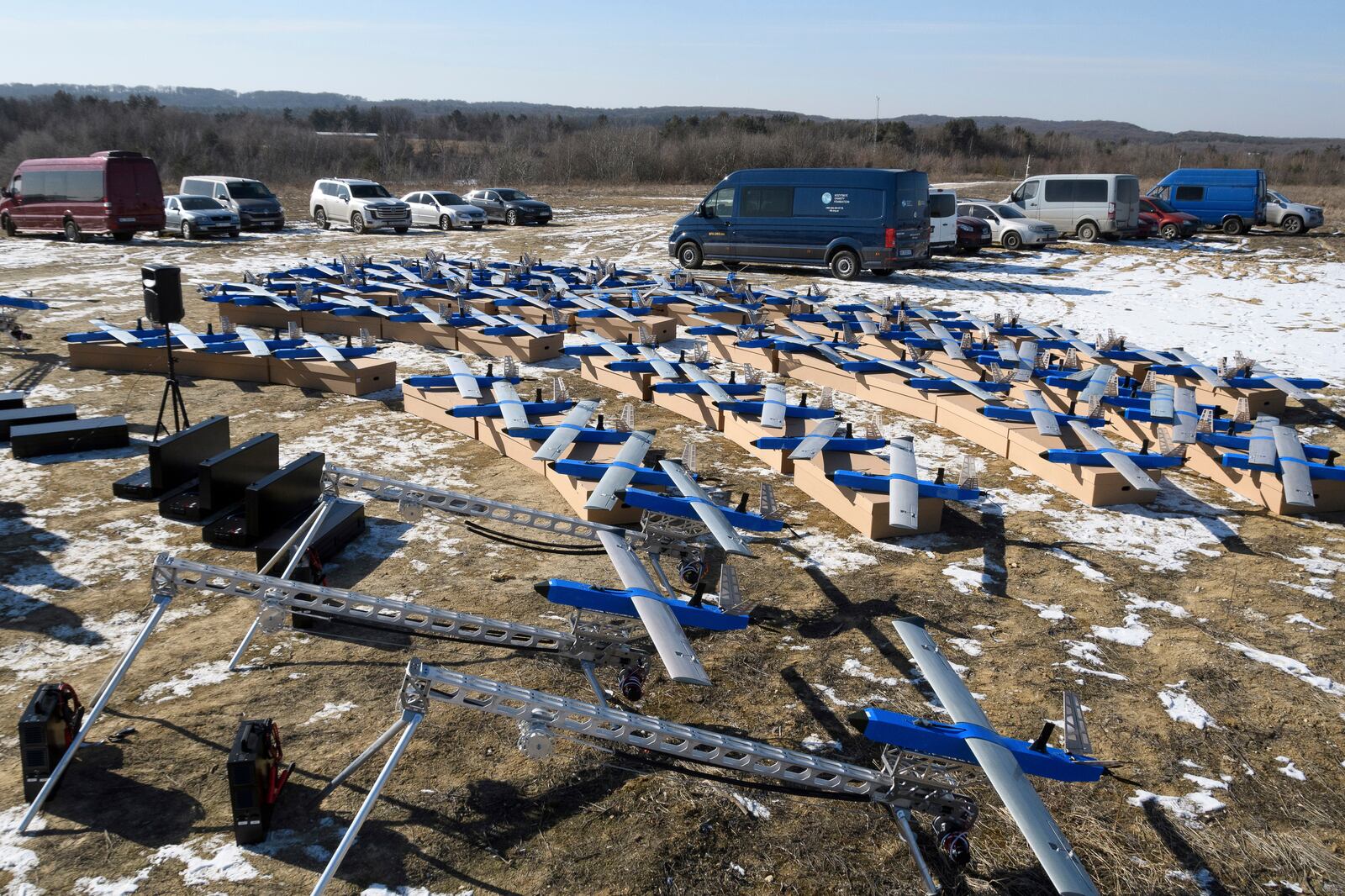 Ukrainian-made fixed-wing Besomar 3210 drone interceptors are handed over to the Armed Forces by Kozytskyi Charity Foundation in an undisclosed location in the Lviv region, western Ukraine, Friday, Feb. 21, 2025. (AP Photo/Mykola Tys)