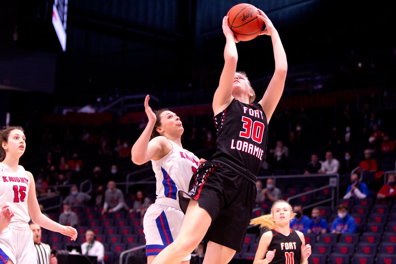 Fort Loramie's Dana Rose shoots against Convoy Crestview's Bailey Gregory during Thursday's Division IV state semifinal at UD Arena. Loramie won 66-24 and Rose scored 22 points. Jeff Gilbert/CONTRIBUTED