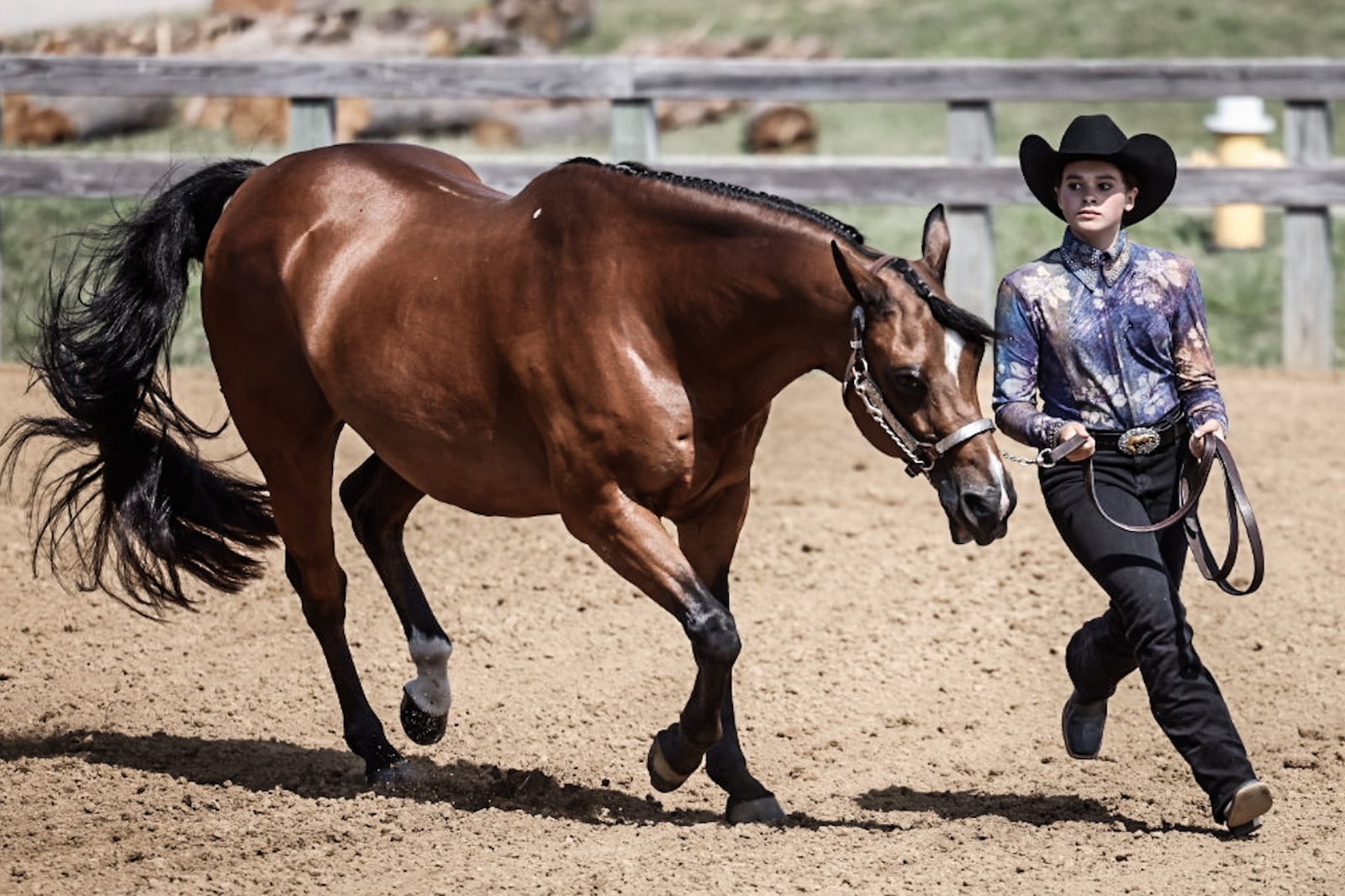 Lacy McNutt, 13, from New Lebanon, is the Western Showmanship Champion with her horse, Kenny, during the 4-H Horse Show at the Montgomery County Fair Tuesday morning July 11, 2023. JIM NOELKER/STAFF