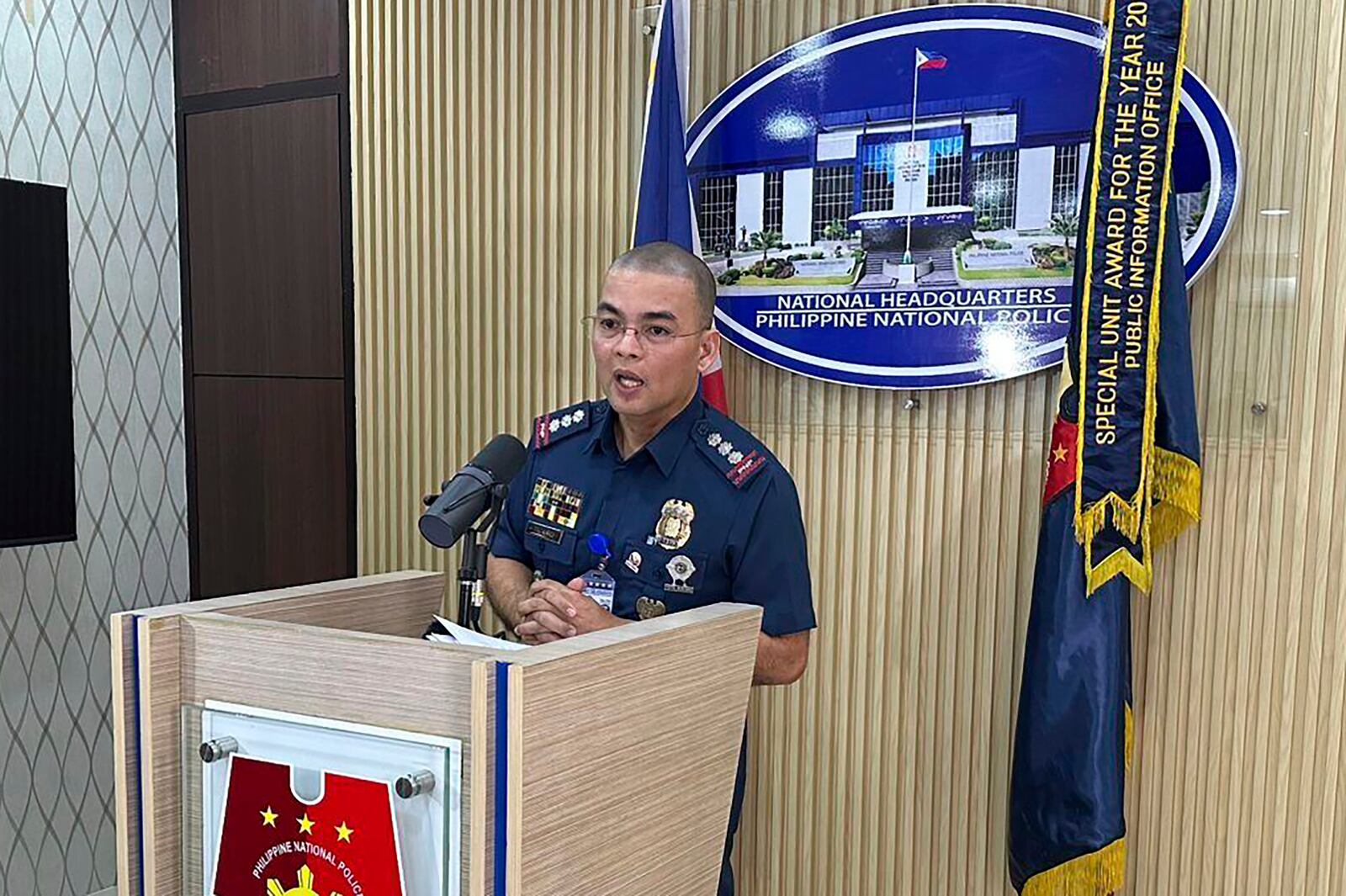 Philippines Police Col. Randulf Tuaño, chief public information office, speaks during a press conference at the Philippine National Police headquarters in Manila Friday, Jan. 31, 2025 as he confirmed that a Philippine police official was one of the passengers killed onboard the American Airlines plane that collided with an Army Blackhawk helicopter in the United States. (AP Photo/Joeal Calupitan)