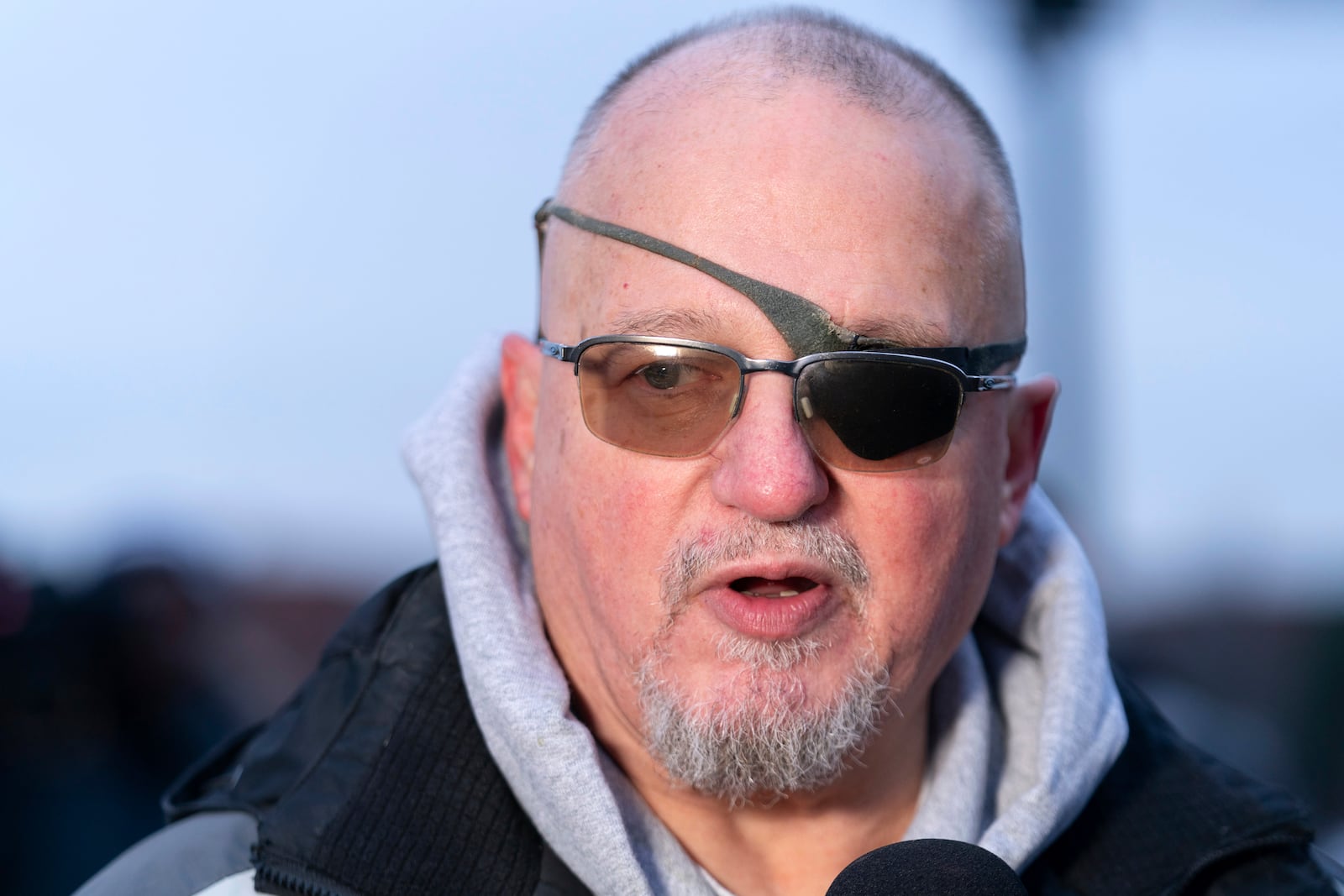 President Donald Trump supporter Oath Keepers founder Stewart Rhodes convicted on charges relating to the Jan. 6 riot at the U.S. Capitol, talks to reporters outside the DC Central Detention Facility, after being released from a jail in Maryland, in Washington, Tuesday, Jan. 21, 2025. (AP Photo/Jose Luis Magana)