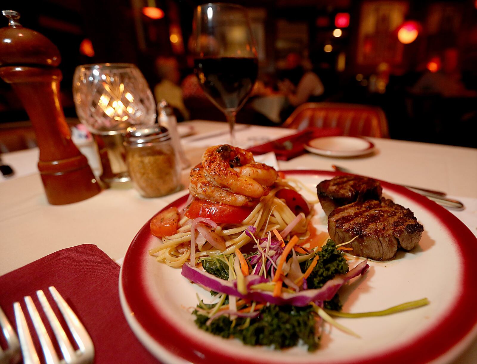 The Oakwood Club's Garlic Shrimp and Linguine with Twin Filet Mignons. E.L. HUBBARD/CONTRIBUTED