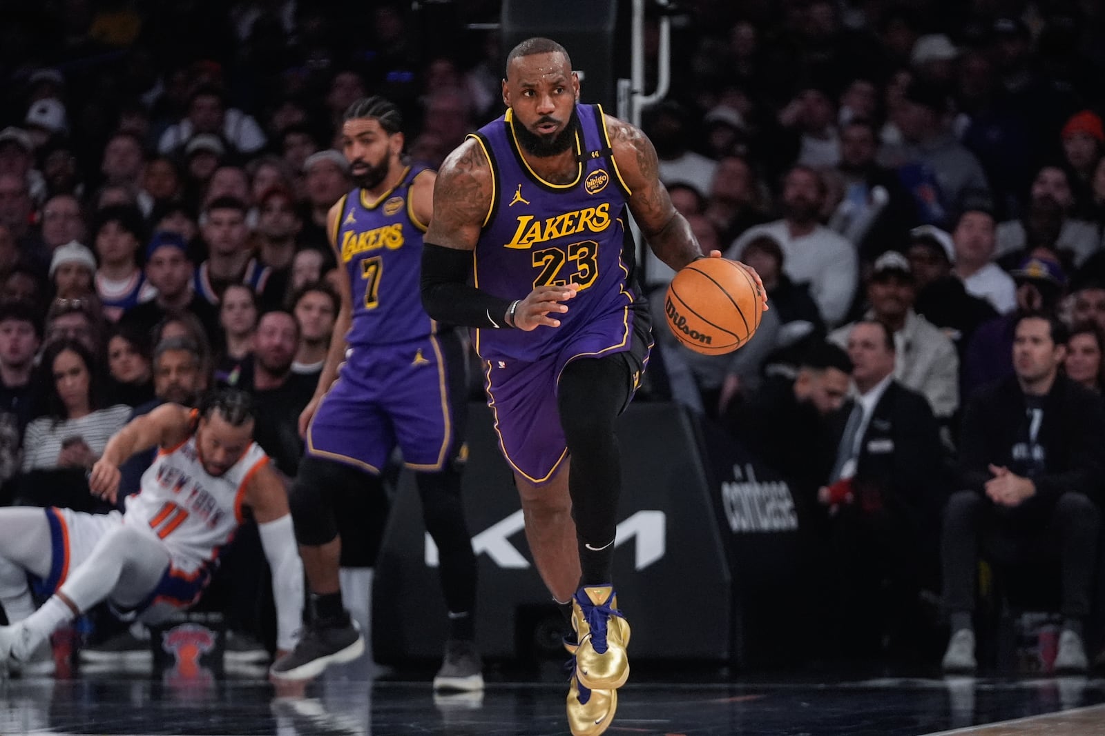 Los Angeles Lakers' LeBron James (23) looks to pass during the second half of an NBA basketball game against the New York Knicks Saturday, Feb. 1, 2025, in New York. (AP Photo/Frank Franklin II)