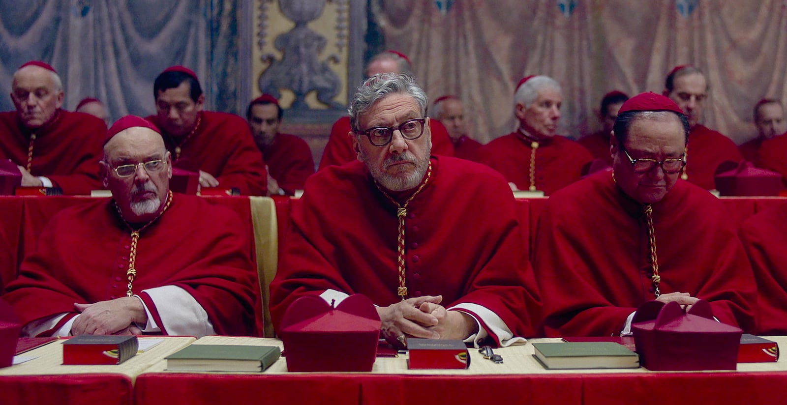 This image released by Focus Features shows Sergio Castellitto, center, in a scene from "Conclave." (Focus Features via AP)