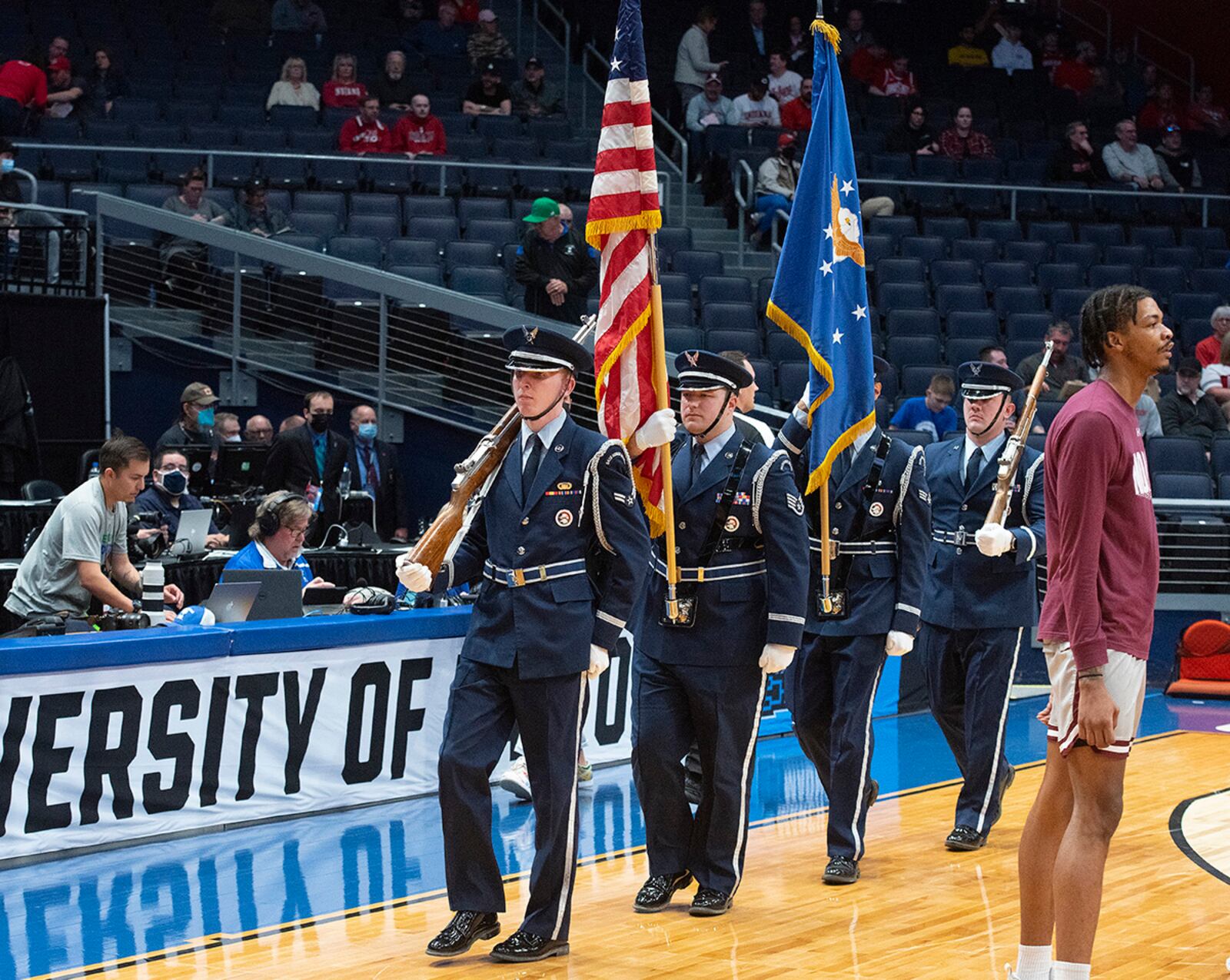 The Wright-Patterson Air Force Base Honor Guard marches onto the floor at University of Dayton Arena on March 15 for the opening ceremony of the first game in the NCAA men’s basketball tournament between Texas Southern and Texas A&M-Corpus Christi. U.S. AIR FORCE PHOTO/R.J. ORIEZ