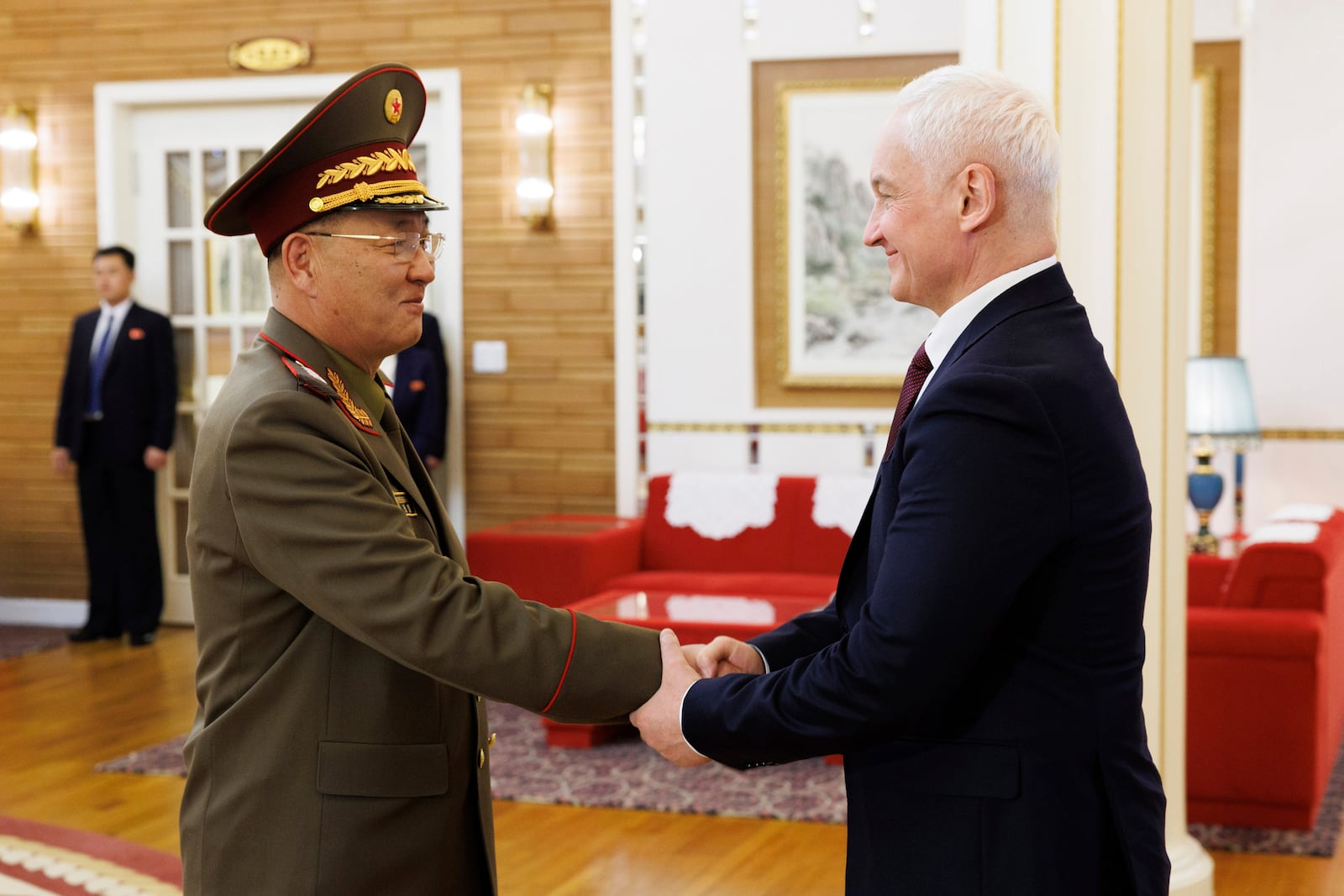 In this photo released by Russian Defense Ministry press service, North Korean Defense Minister No Kwang Chol, left, and Russian Defense Minister Andrei Belousov, right, shake hands during their meeting in Pyongyang, North Korea, Friday, Nov. 29, 2024. (Vadim Savitsky, Russian Defense Ministry Press Service via AP)