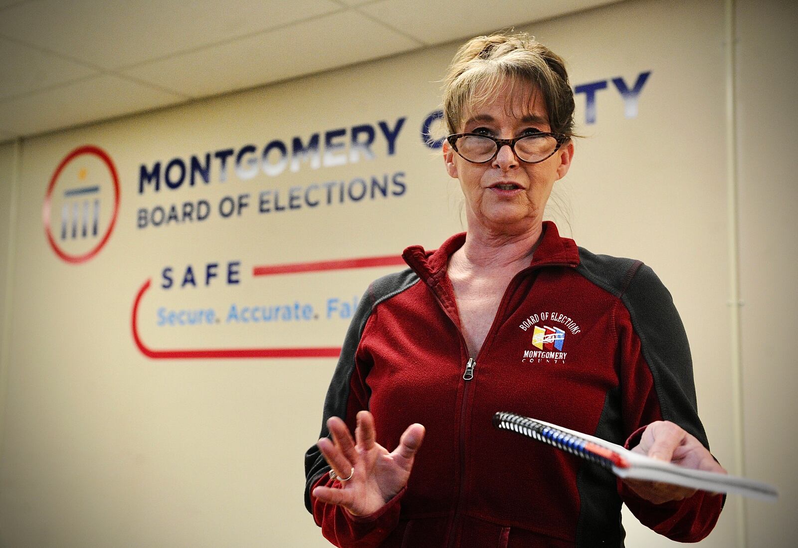 Carolyn Clark, Montgomery County voter services administrator, explains in-person early voting procedures during a media open house Wednesday March 23, 2022, at the Montgomery County Board of Elections Office.  MARSHALL GORBY\STAFF