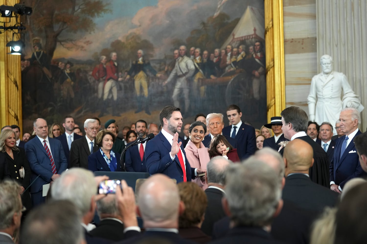 
                        JD Vance is sworn in as vice president by Supreme Court Associate Justice Brett Kavanaugh during the inauguration of Donald Trump as the 47th president in the Rotunda at the Capitol in Washington on Monday morning, Jan. 20, 2025. (Doug Mills/The New York Times)
                      