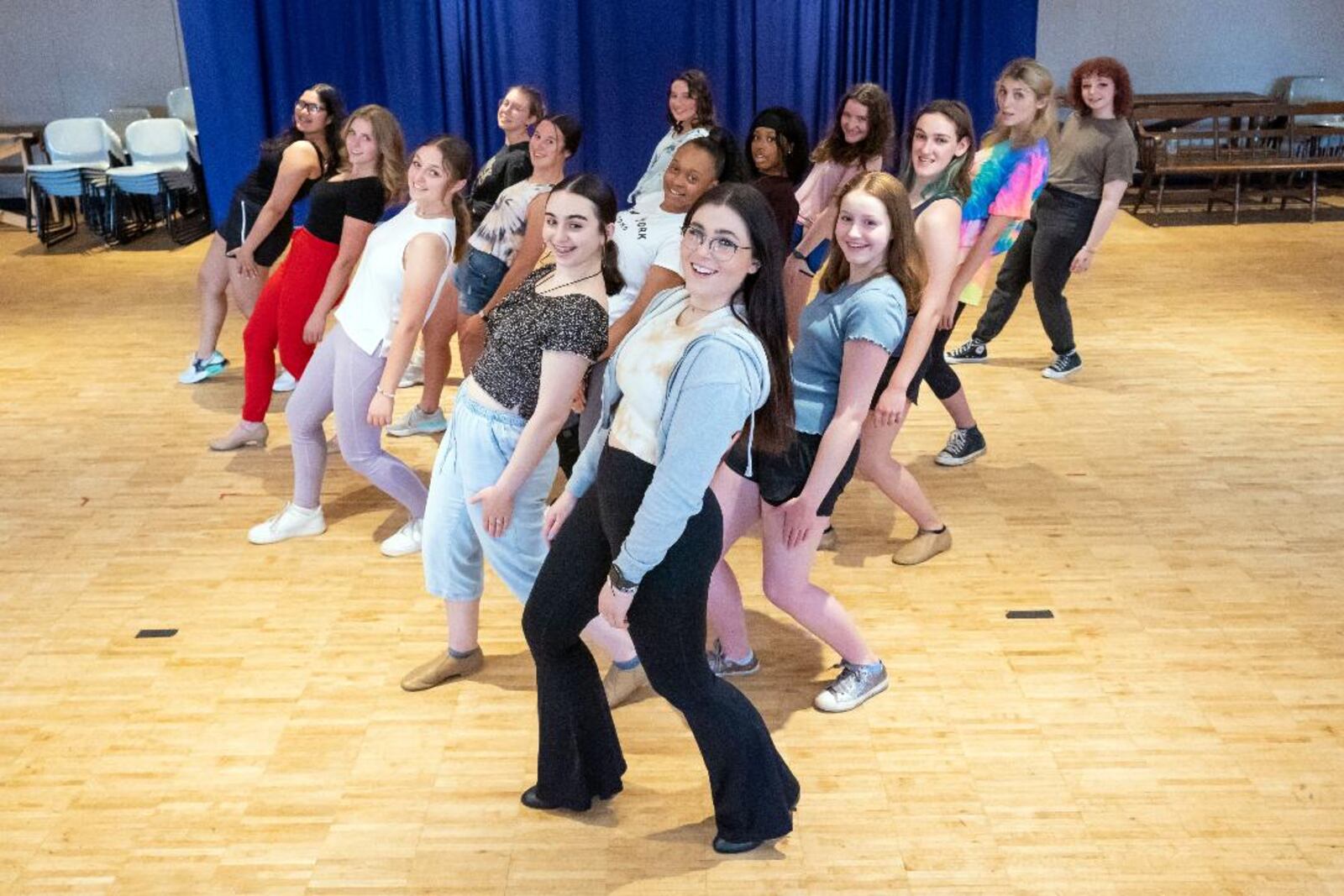 Isabel Rawlins (center as Morticia Addams) and cast in rehearsal for the Muse Machine's production of "The Addams Family," slated June 17-19. PHOTO BY MATT SILVER