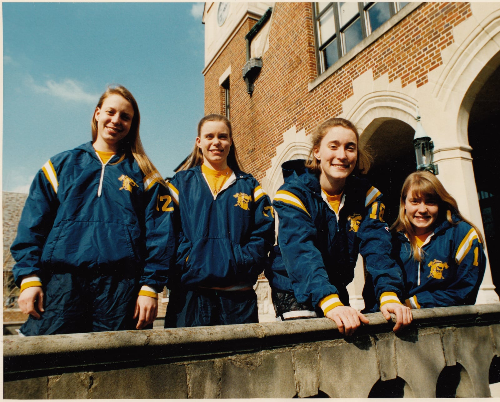 The quadruplets are shown in 1993. Katy, Patty, Molly and Amy pose in front of Oakwood High School.